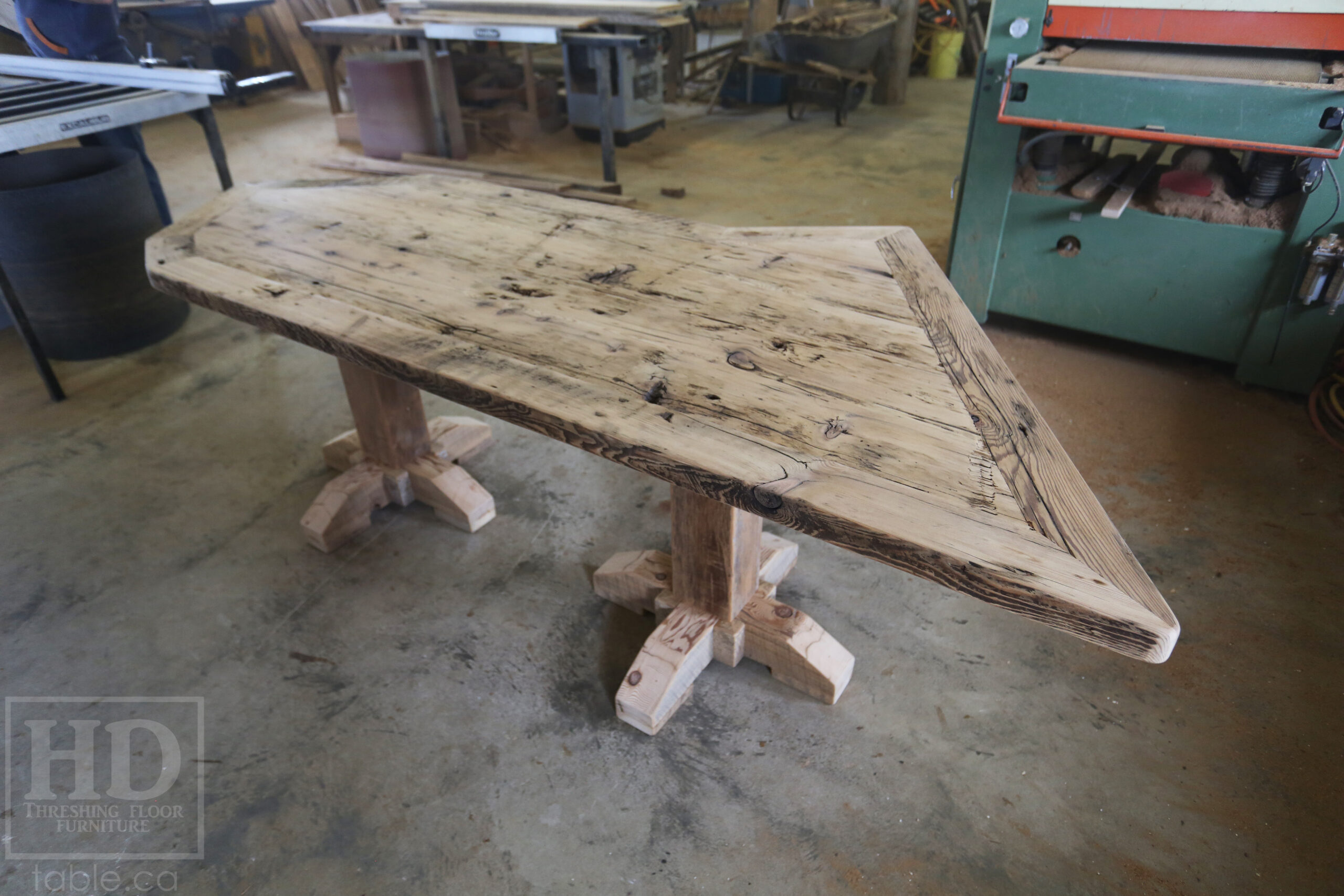Custom Ontario Barnwood Desk – Barn Beam Posts – Modified Shape to Accommodate a Unique Space -Reclaimed Hemlock Threshing Floor 2” Top – Original edges & distressing maintained  – www.table.ca