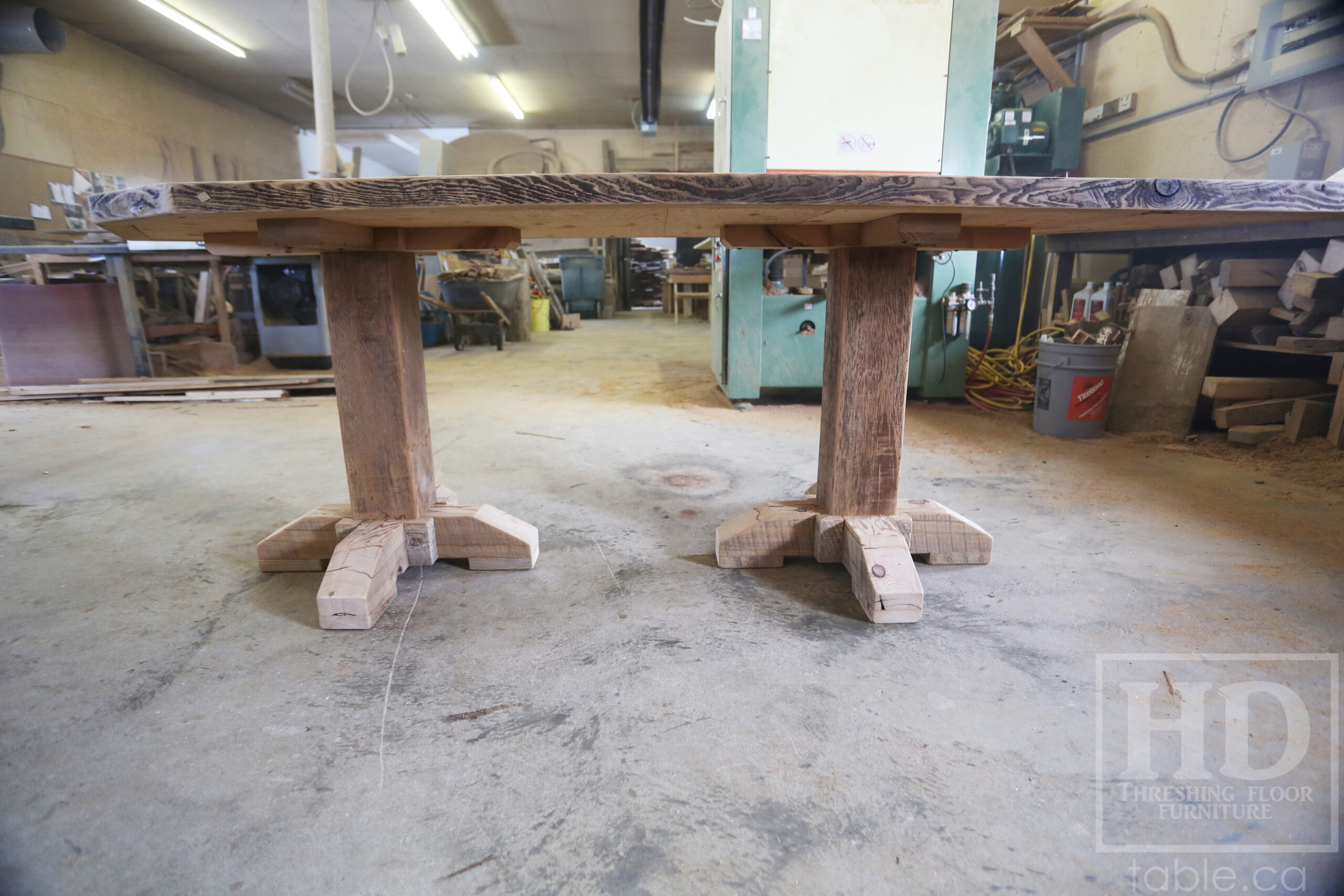 Custom Ontario Barnwood Desk â€“ Barn Beam Posts â€“ Modified Shape to Accommodate a Unique Space - Reclaimed Hemlock Threshing Floor 2â€ Top â€“ Original edges & distressing maintained  â€“ www.table.ca