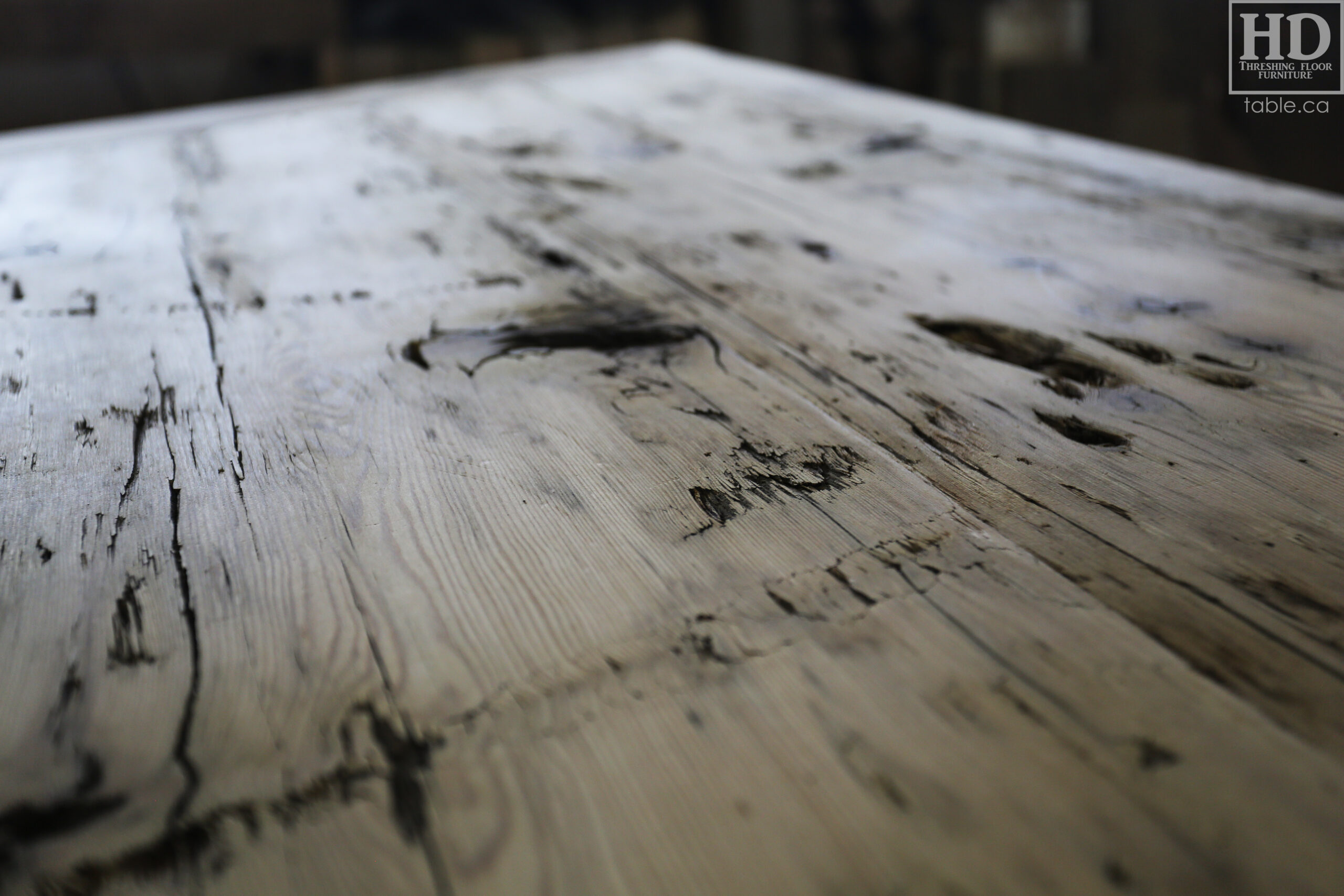 Custom Ontario Barnwood Desk â€“ Barn Beam Posts â€“ Modified Shape to Accommodate a Unique Space - Reclaimed Hemlock Threshing Floor 2â€ Top â€“ Original edges & distressing maintained  â€“ www.table.ca