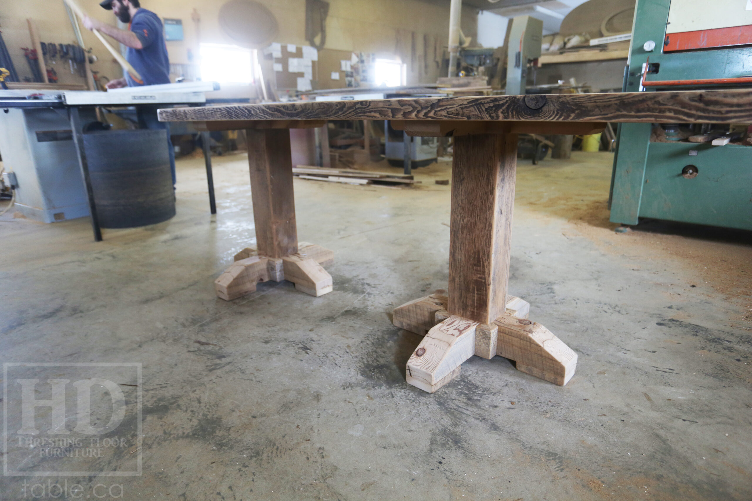 Custom Ontario Barnwood Desk â€“ Barn Beam Posts â€“ Modified Shape to Accommodate a Unique Space - Reclaimed Hemlock Threshing Floor 2â€ Top â€“ Original edges & distressing maintained  â€“ www.table.ca