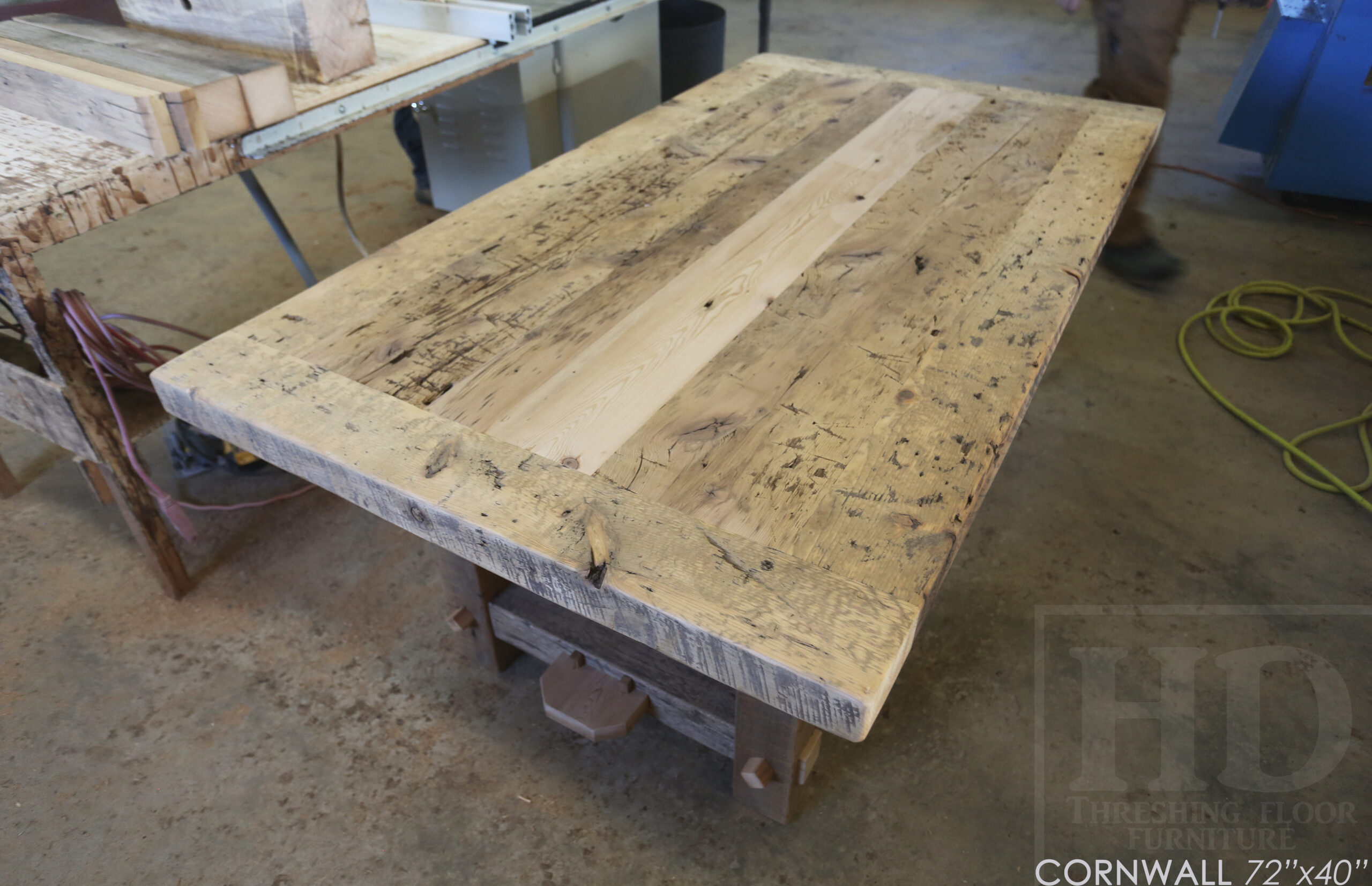 72â€ Ontario Barnwood Table we made for a Cornwall, Ontario home â€“ 40â€ wide - Frame Base / 10â€ overhand at ends â€“ Extra thick Option 3â€ Top Reclaimed Hemlock Threshing Floor Construction â€“ Original edges & distressing maintained â€“ Premium epoxy + matte polyurethane finish â€“ www.table.ca