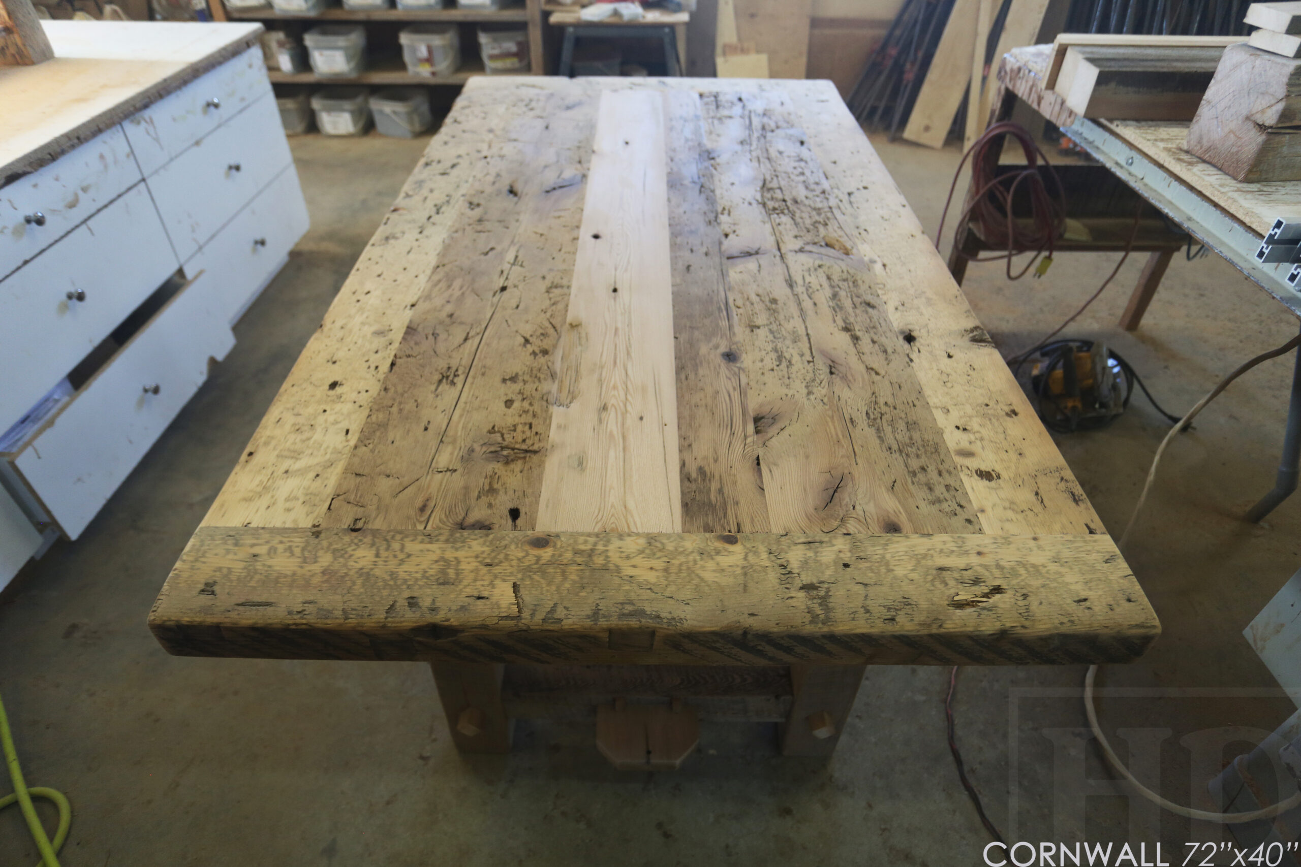 72â€ Ontario Barnwood Table we made for a Cornwall, Ontario home â€“ 40â€ wide - Frame Base / 10â€ overhand at ends â€“ Extra thick Option 3â€ Top Reclaimed Hemlock Threshing Floor Construction â€“ Original edges & distressing maintained â€“ Premium epoxy + matte polyurethane finish â€“ www.table.ca