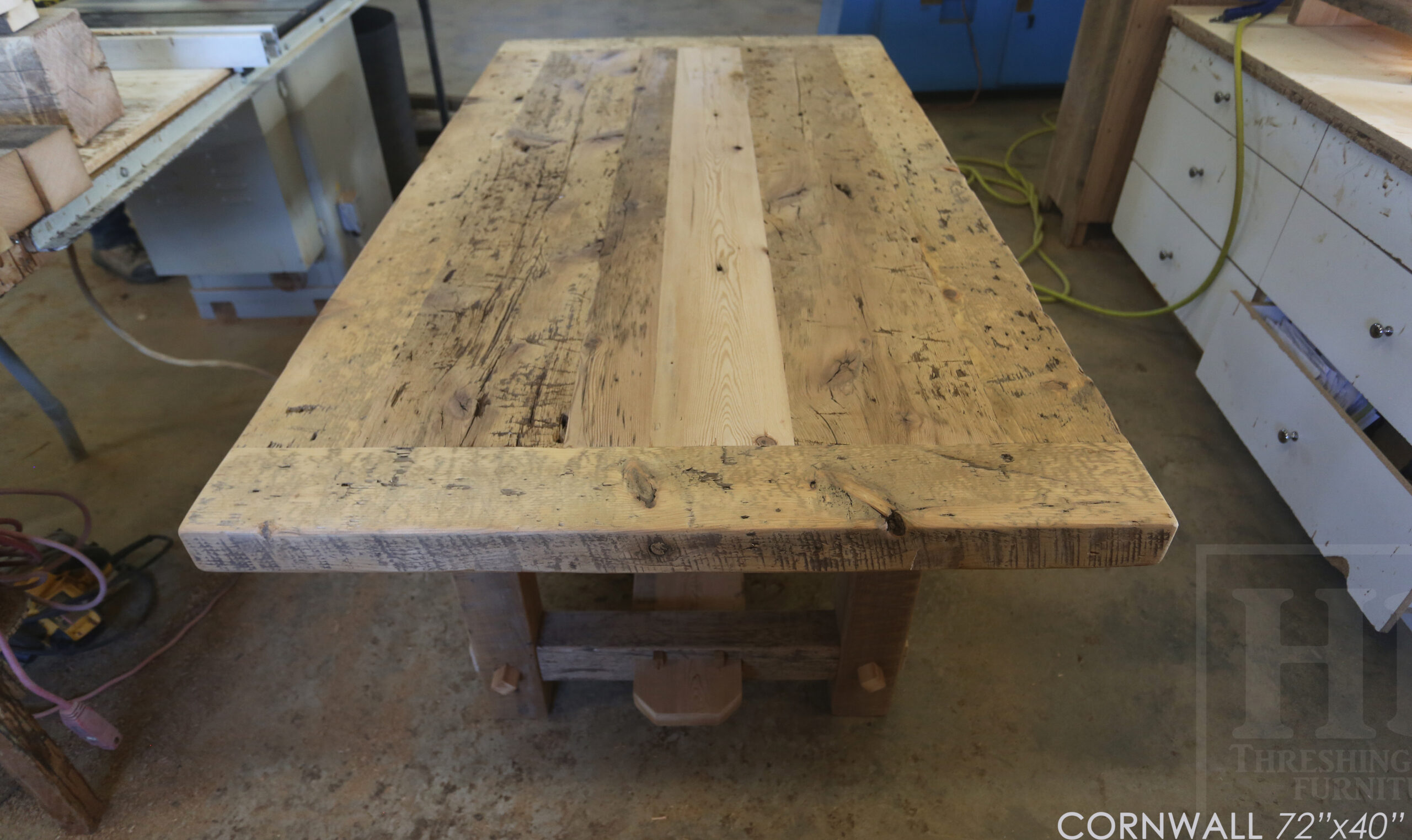 72â€ Ontario Barnwood Table we made for a Cornwall, Ontario home â€“ 40â€ wide - Frame Base / 10â€ overhand at ends â€“ Extra thick Option 3â€ Top Reclaimed Hemlock Threshing Floor Construction â€“ Original edges & distressing maintained â€“ Premium epoxy + matte polyurethane finish â€“ www.table.ca