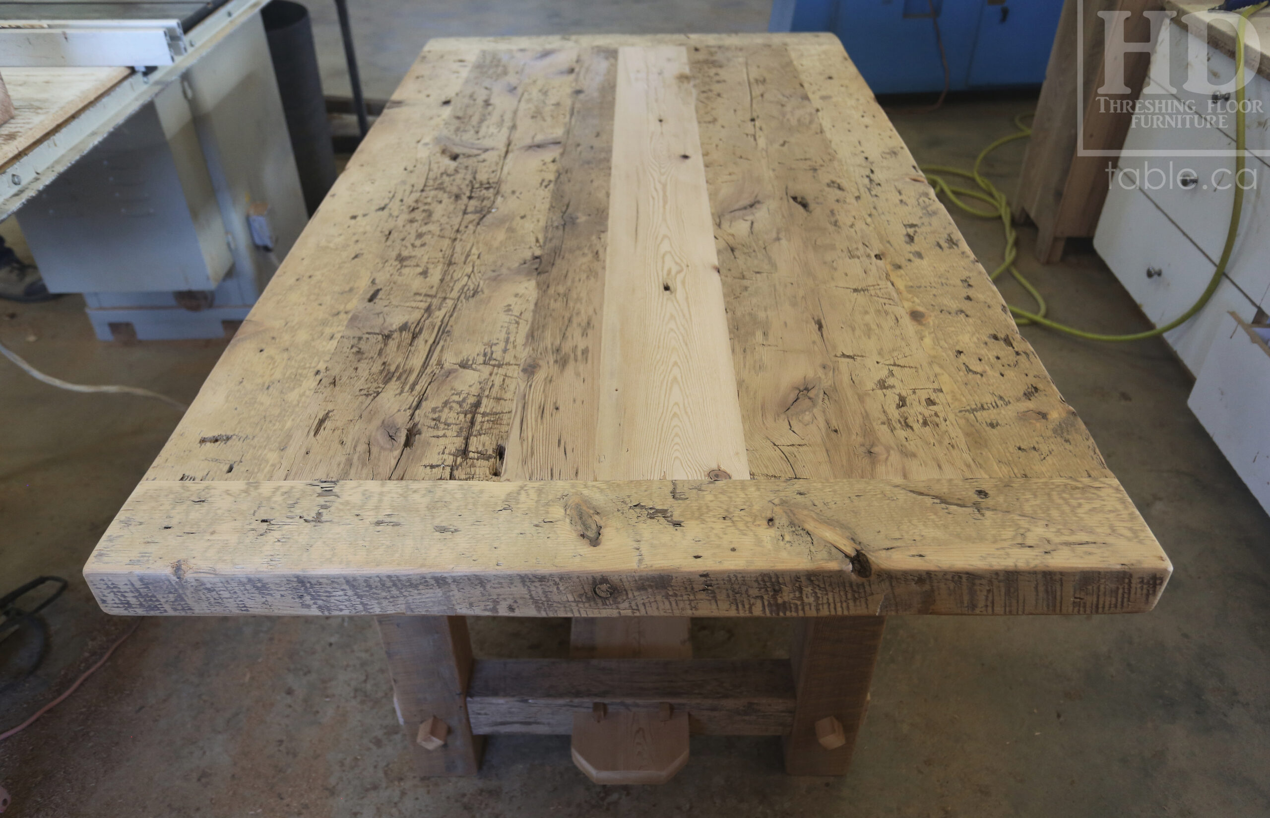 72â€ Ontario Barnwood Table we made for a Cornwall, Ontario home â€“ 40â€ wide - Frame Base / 10â€ overhand at ends â€“ Extra thick Option 3â€ Top Reclaimed Hemlock Threshing Floor Construction â€“ Original edges & distressing maintained â€“ Premium epoxy + matte polyurethane finish â€“ www.table.ca