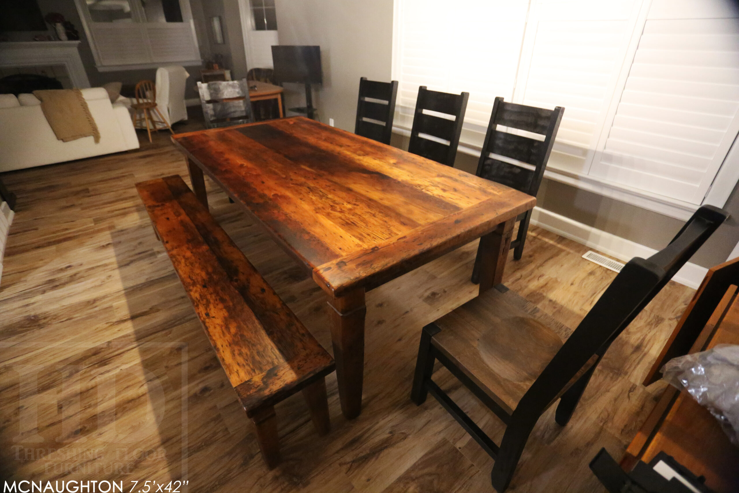 7.5’ Ontario Barnwood Table we made for a Sudbury, Ontario home – 42” wide – Harvest Base / Tapered with a Notch Windbrace Beam Legs - Reclaimed Hemlock Threshing Floor Construction – Original distressing & edges maintained – Premium epoxy + matte polyurethane finish – 7.5’ [matching] Harvest Bench – Cottager Chairs / Wormy Maple / Black Painted Frame / Seat Stained Colour of Table / Matte polyurethane clearcoat finish -  www.table.ca
