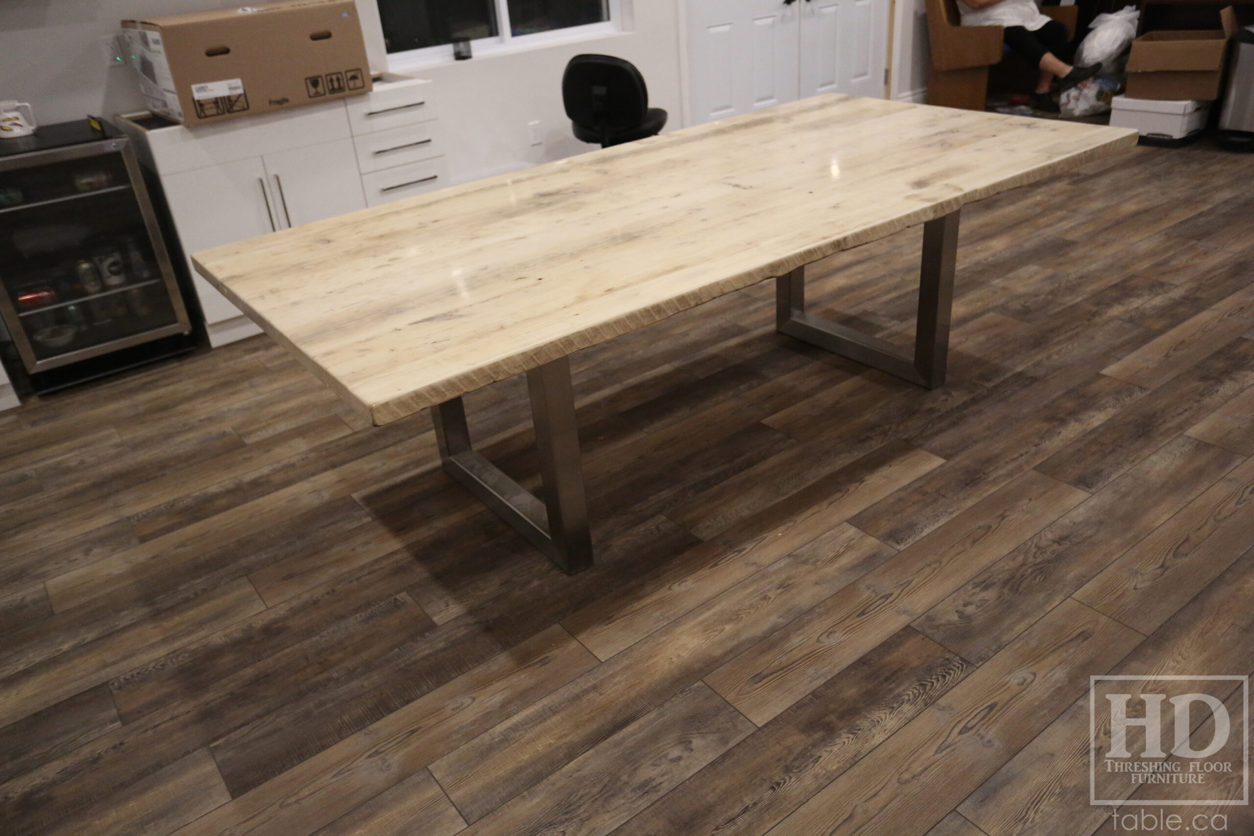 Project details: 8' Ontario Barnwood Boardroom Table - 48" wide â€“ Stainless Steel U Shaped Base â€“ Reclaimed Old Growth Hemlock Threshing Floor Construction â€“ No bread-edge boards - Original edges & distressing maintained â€“ Bleached Option - Premium epoxy + satin polyurethane finish - www.table.ca