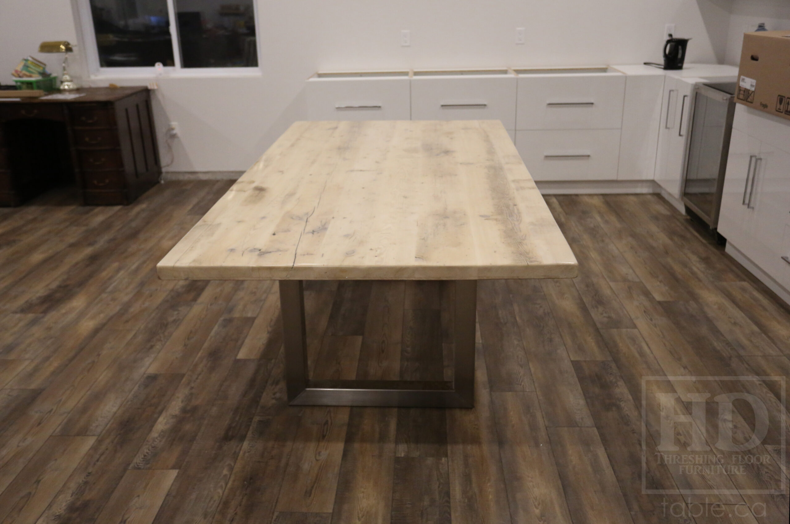 Project details: 8' Ontario Barnwood Boardroom Table - 48" wide – Stainless Steel U Shaped Base – Reclaimed Old Growth Hemlock Threshing Floor Construction – No bread-edge boards - Original edges & distressing maintained – Bleached Option - Premium epoxy + satin polyurethane finish - www.table.ca