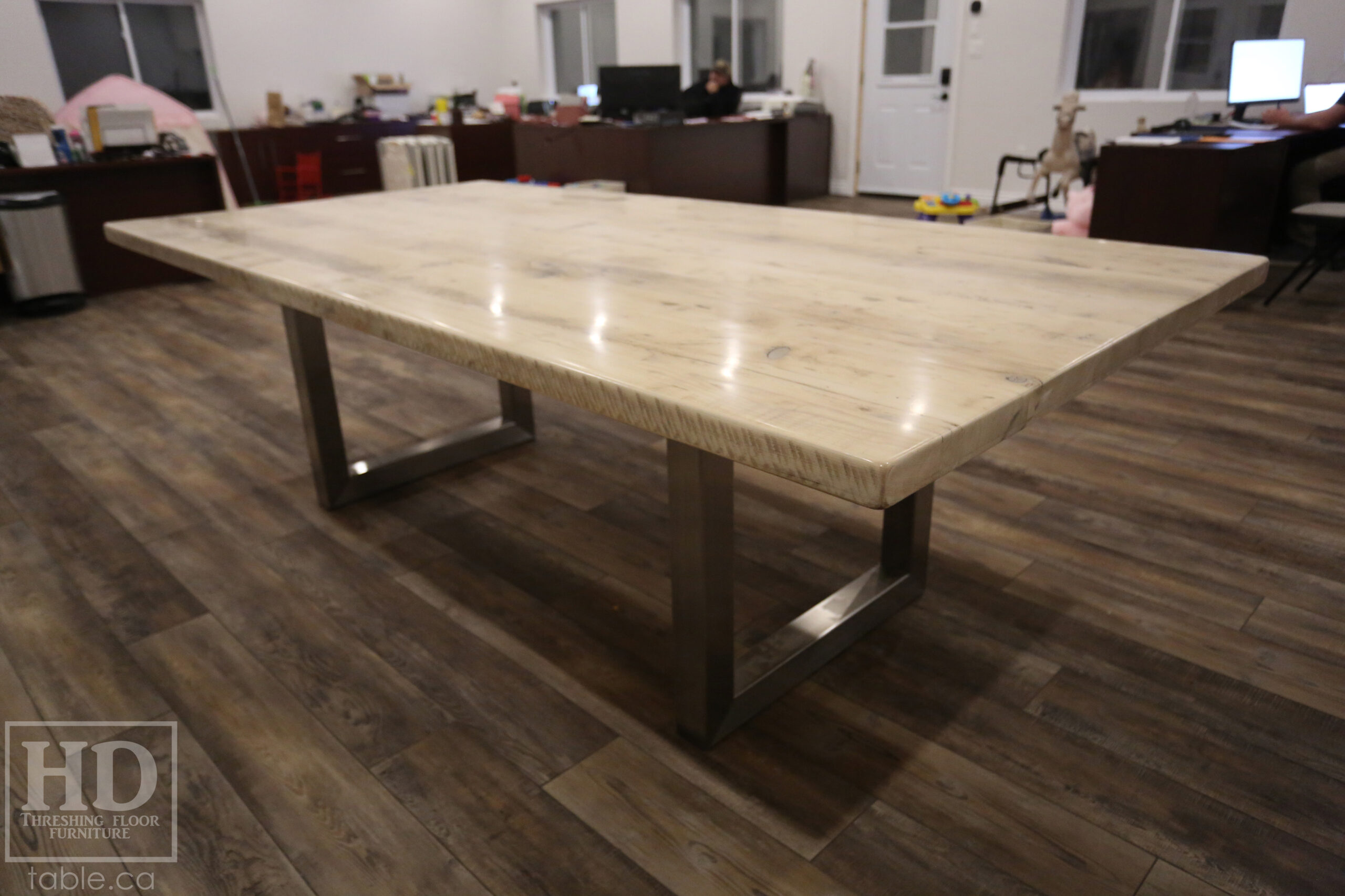 Project details: 8' Ontario Barnwood Boardroom Table - 48" wide â€“ Stainless Steel U Shaped Base â€“ Reclaimed Old Growth Hemlock Threshing Floor Construction â€“ No bread-edge boards - Original edges & distressing maintained â€“ Bleached Option - Premium epoxy + satin polyurethane finish - www.table.ca