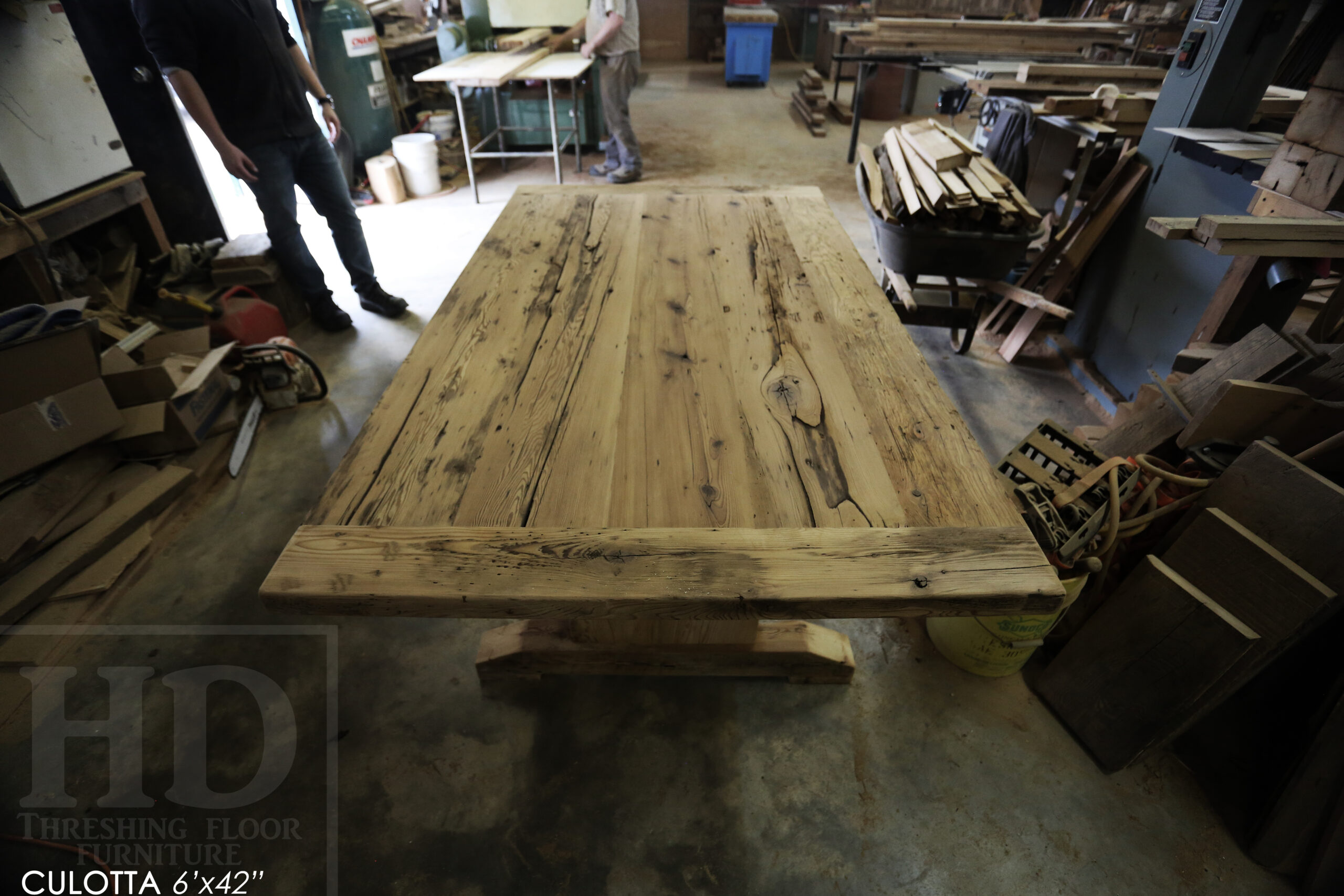 6â€™ Reclaimed Ontario Barnwood Table we made for a Waterdown, Ontario home â€“ Trestle Base [No bottom rail option] - Old Growth Hemlock Threshing Floor Construction â€“ Original edges & distressing maintained â€“Bread Edges - Premium epoxy + satin polyurethane finish - www.table.ca