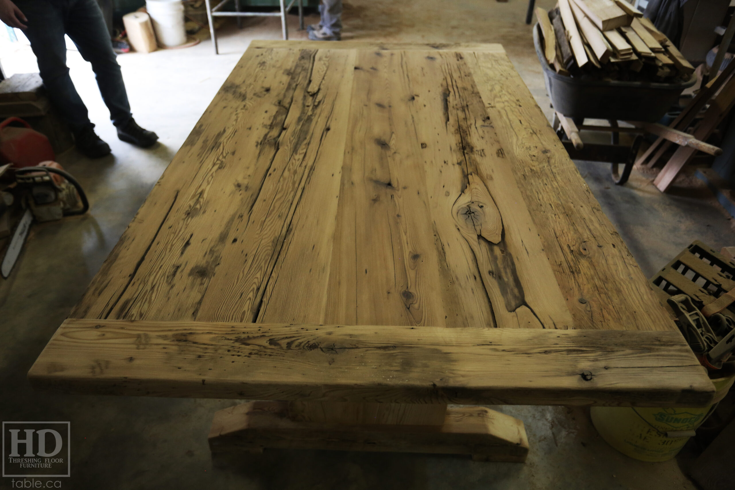 6â€™ Reclaimed Ontario Barnwood Table we made for a Waterdown, Ontario home â€“ Trestle Base [No bottom rail option] - Old Growth Hemlock Threshing Floor Construction â€“ Original edges & distressing maintained â€“Bread Edges - Premium epoxy + satin polyurethane finish - www.table.ca