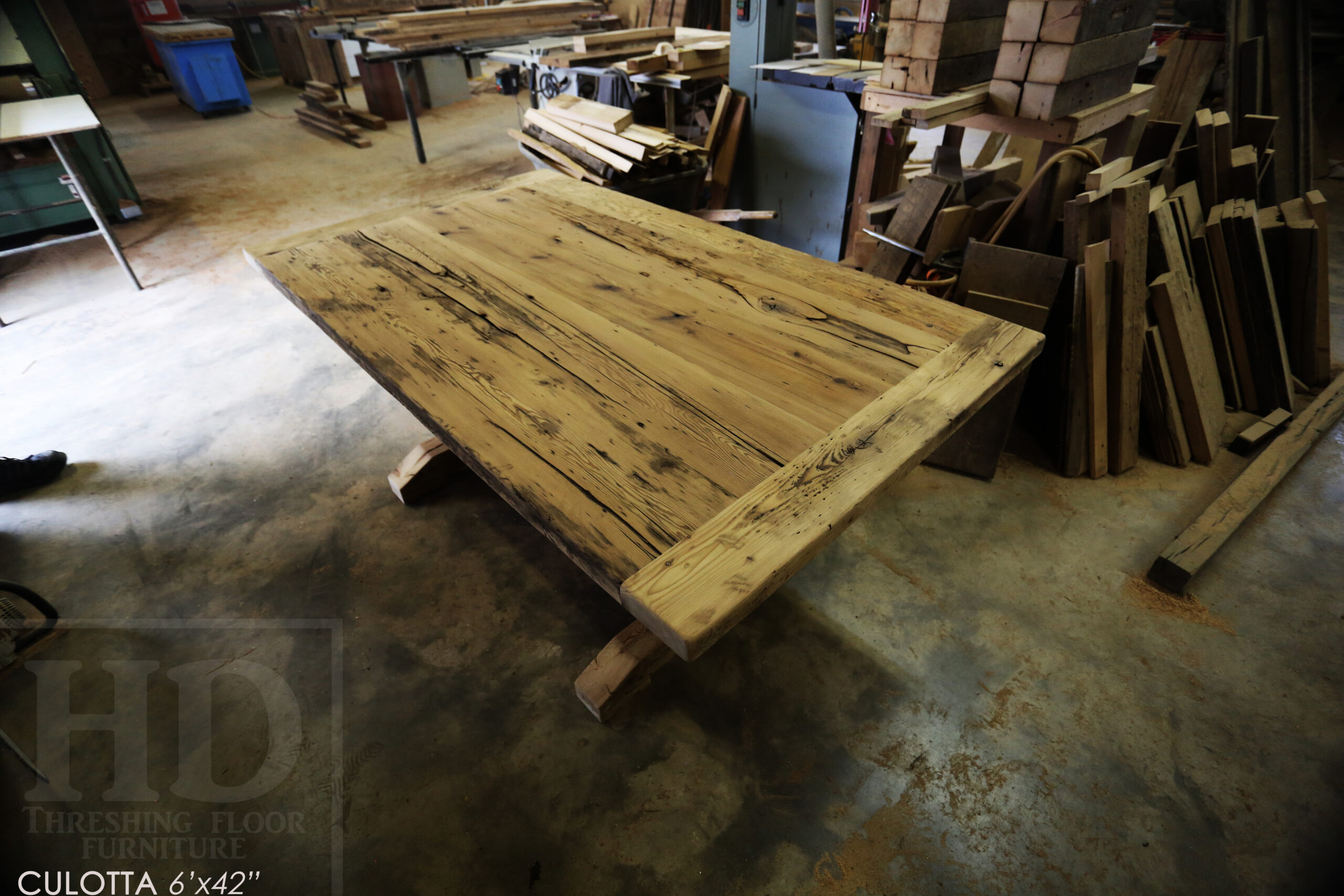 6â€™ Reclaimed Ontario Barnwood Table we made for a Waterdown, Ontario home â€“ Trestle Base [No bottom rail option] - Old Growth Hemlock Threshing Floor Construction â€“ Original edges & distressing maintained â€“Bread Edges - Premium epoxy + satin polyurethane finish - www.table.ca