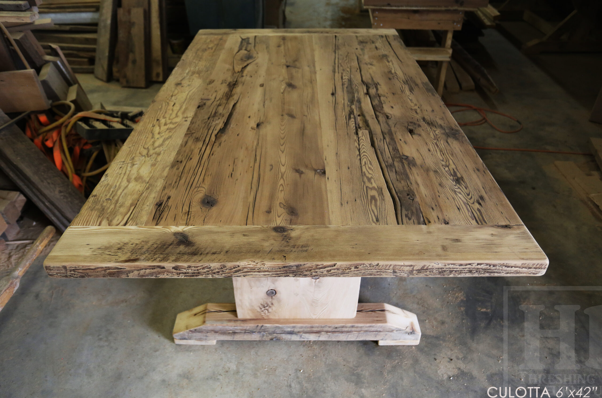 6â€™ Reclaimed Ontario Barnwood Table we made for a Waterdown, Ontario home â€“ Trestle Base [No bottom rail option] - Old Growth Hemlock Threshing Floor Construction â€“ Original edges & distressing maintained â€“Bread Edges - Premium epoxy + satin polyurethane finish - www.table.ca