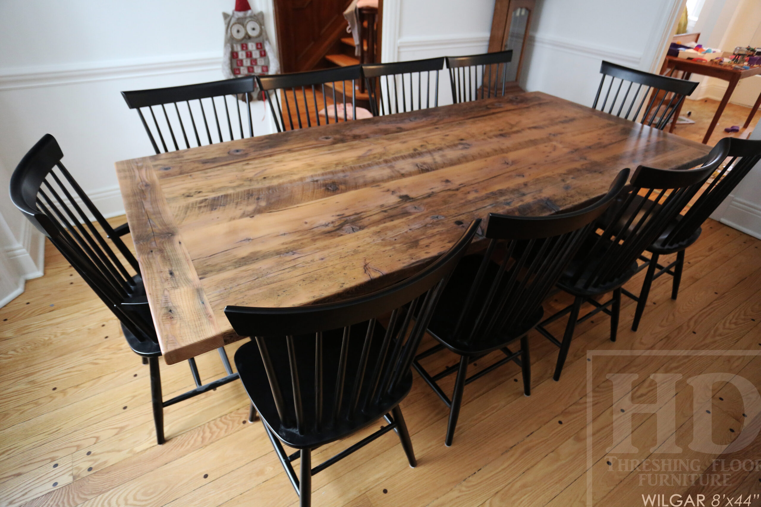 8’ Ontario Barnwood Table we made for an Etobicoke, Ontario home – 44” wide – Sawbuck Base – Hemlock Threshing Floor Construction – Original edges & distressing maintained – Premium epoxy + matte polyurethane finish – 10 Shaker Chairs / Wormy Maple / Painted Black / Polyurethane clearcoat finish – www.table.ca