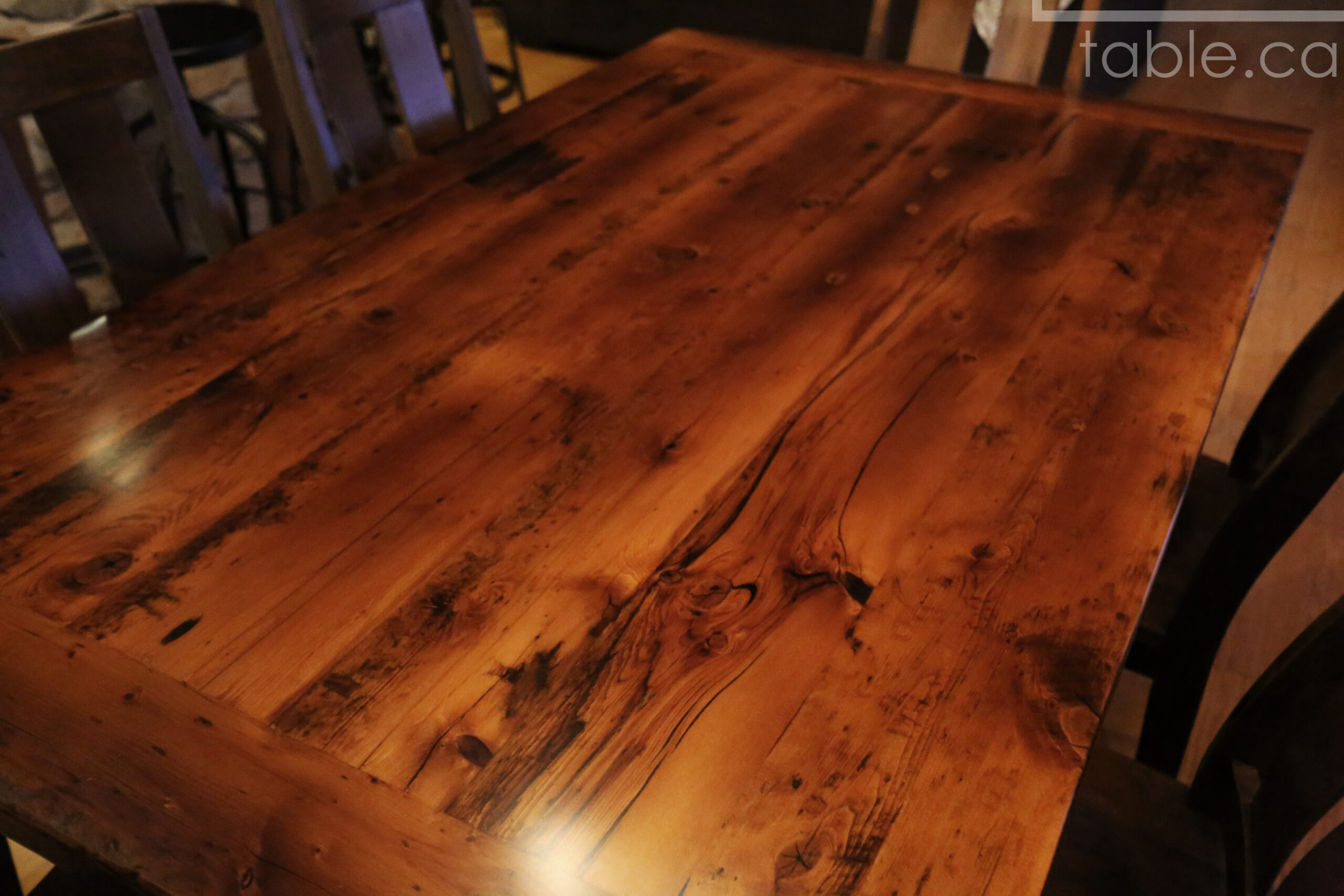 Project details: 70” Reclaimed Ontario Barnwood Table we made for a Sudbury, Ontario home - 42" wide – Harvest Base: Tapered [no notch] Windbrace Beam Legs - Old Growth Hemlock Threshing Floor Construction – Bread edge Ends - Original edges & distressing maintained - Premium epoxy + satin polyurethane finish – One 18” Leaf Extension – 6 Eastbrook Chairs / Wormy Maple / Polyurethane clearcoat finish - www.table.ca