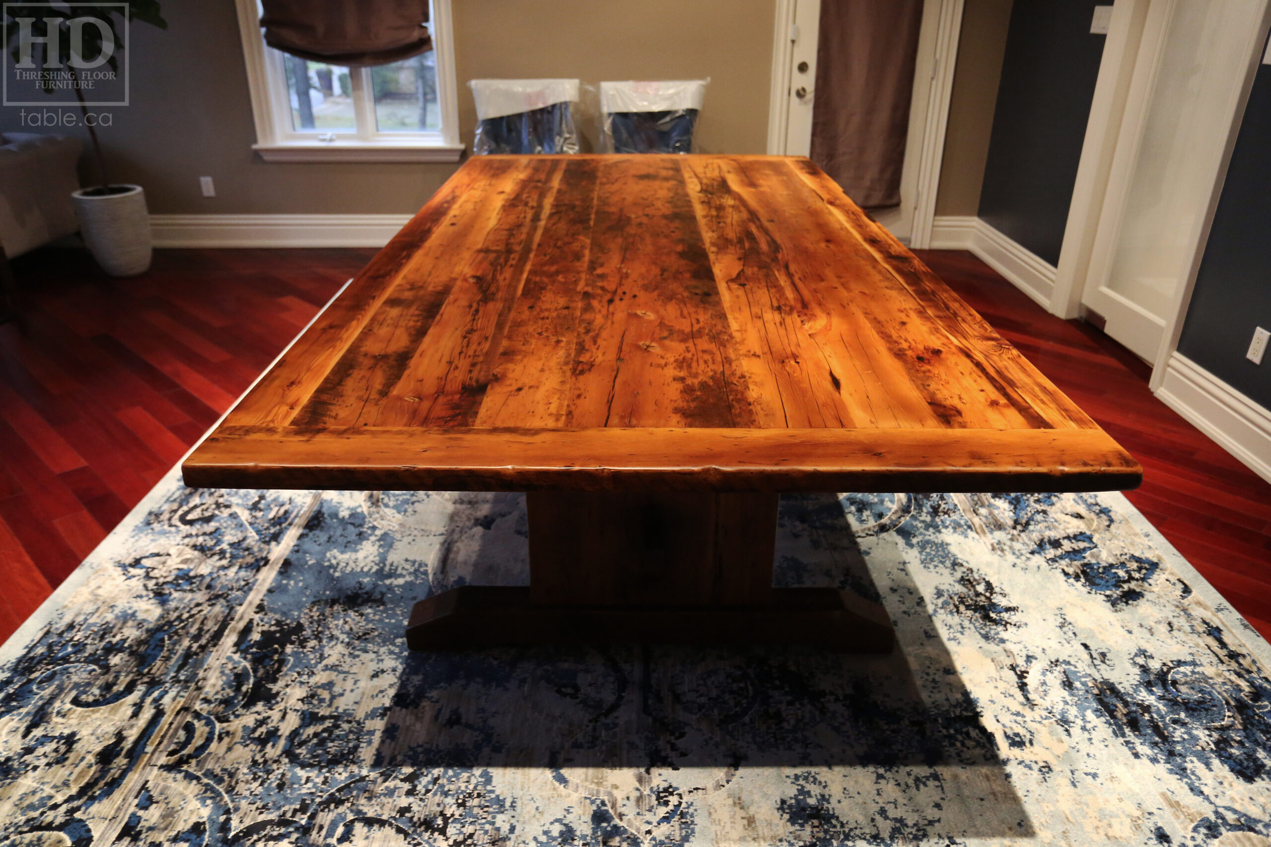 Project details: 10' Ontario Barnwood Table we made for a Woodbridge, Ontario home - 60" wide â€“ Trestle Base â€“ Reclaimed Old Growth Hemlock Threshing Floor Construction / Minimal Sanding out of Original Patina â€“ Original edges & distressing maintained â€“ Premium epoxy + matte polyurethane finish - www.table.ca