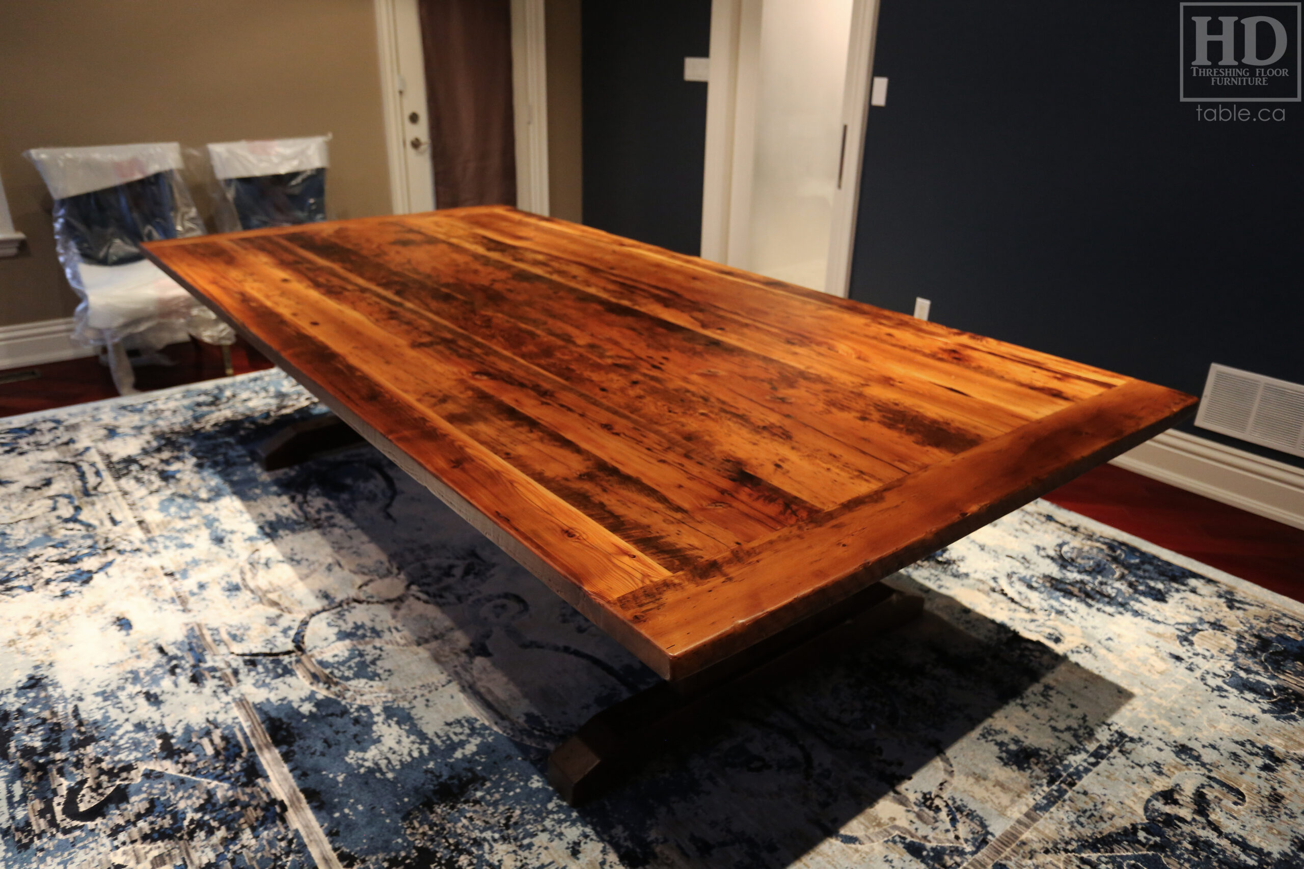 Project details: 10' Ontario Barnwood Table we made for a Woodbridge, Ontario home - 60" wide – Trestle Base – Reclaimed Old Growth Hemlock Threshing Floor Construction / Minimal Sanding out of Original Patina – Original edges & distressing maintained – Premium epoxy + matte polyurethane finish - www.table.ca
