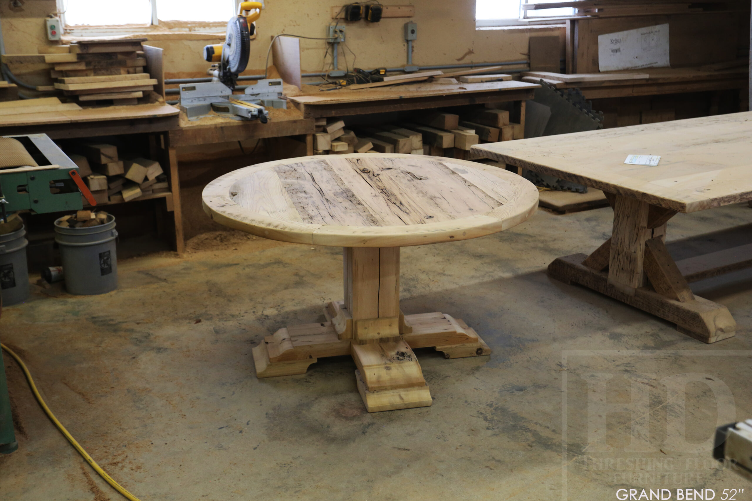 54" Round Ontario Barnwood Table - Hemlock Threshing Floor 2" Top - Customized Pedestal Base / Painted Black with Sandthroughs - Original edges & distressing maintained - Greytone Treatment Option - Premium epoxy + satin polyurethane finish - www.table.ca