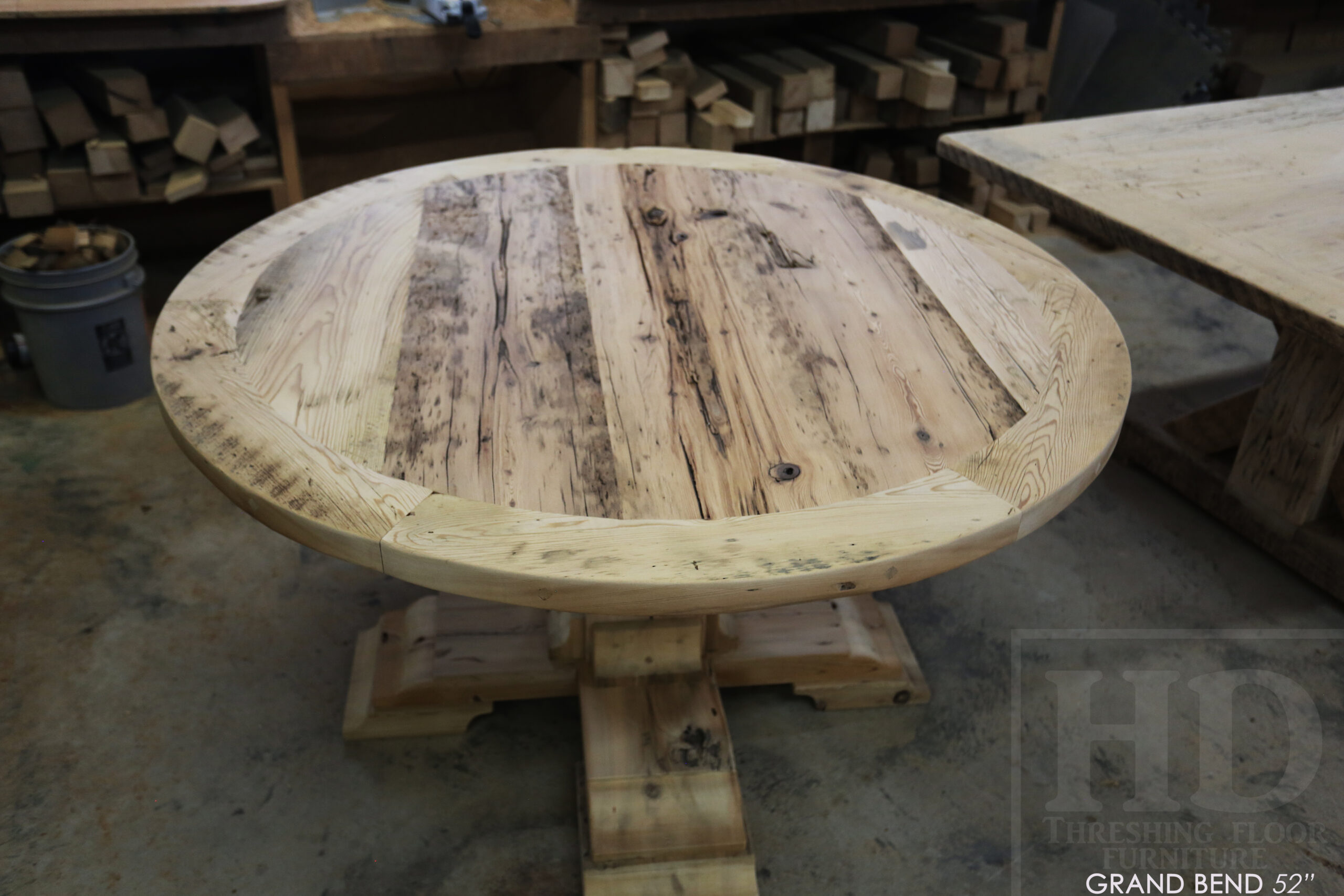 54" Round Ontario Barnwood Table - Hemlock Threshing Floor 2" Top - Customized Pedestal Base / Painted Black with Sandthroughs - Original edges & distressing maintained - Greytone Treatment Option - Premium epoxy + satin polyurethane finish - www.table.ca