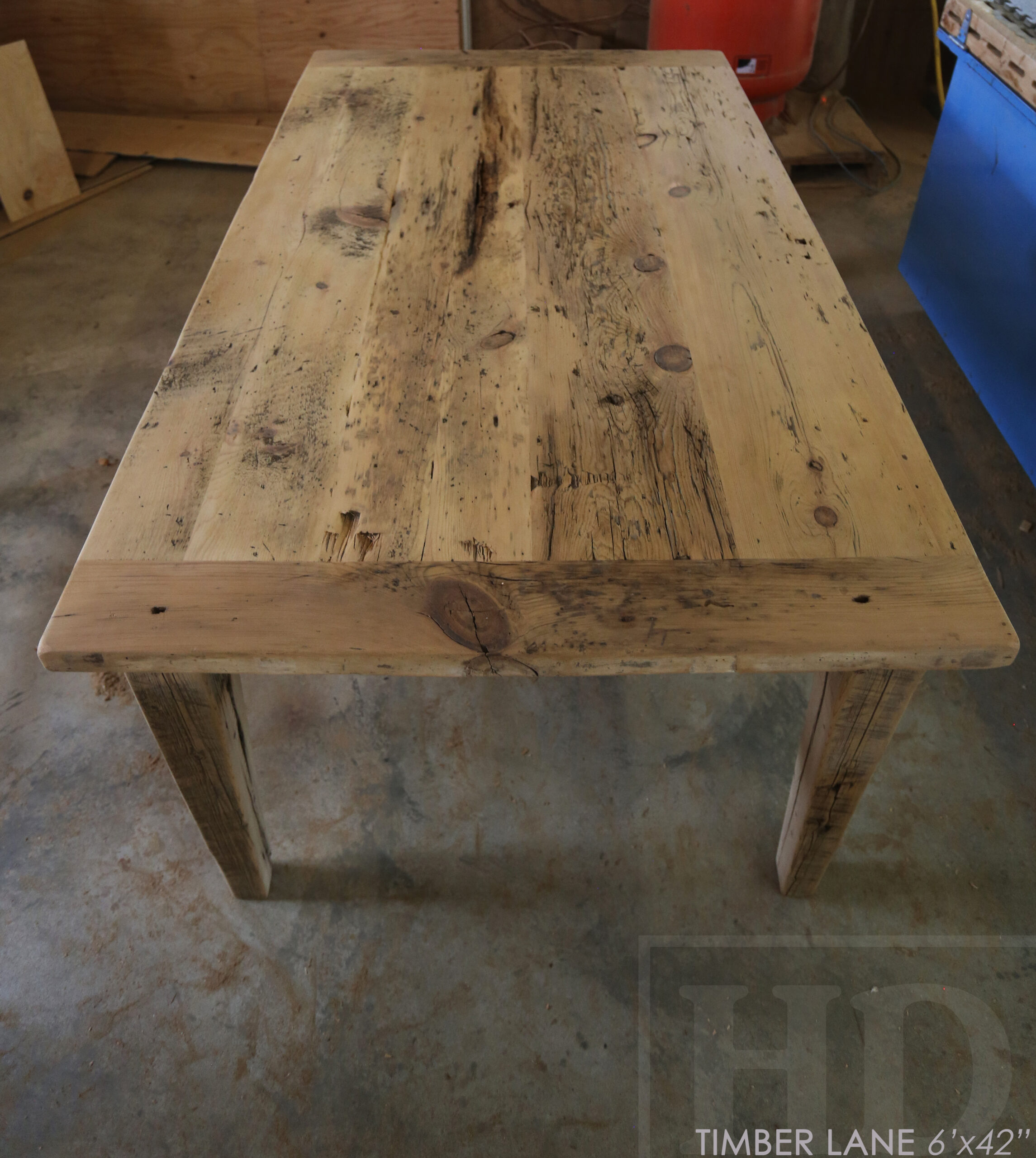 6’ Reclaimed Ontario Barnwood Table we made for an Thornbury, Ontario home – 42” wide – Harvest Base / Tapered Windbrace Beam Legs - [2] Drawers 24” wide on long sides - Old Growth Hemlock Threshing Floor Construction - Original edges & distressing maintained – Bread Edge Ends - Premium epoxy + matte polyurethane finish – [6] Athena Chairs / Wormy Maple / Black Painted Frame; Seat Stained Colour of Table / Polyurethane clearcoat finish - www.table.ca
