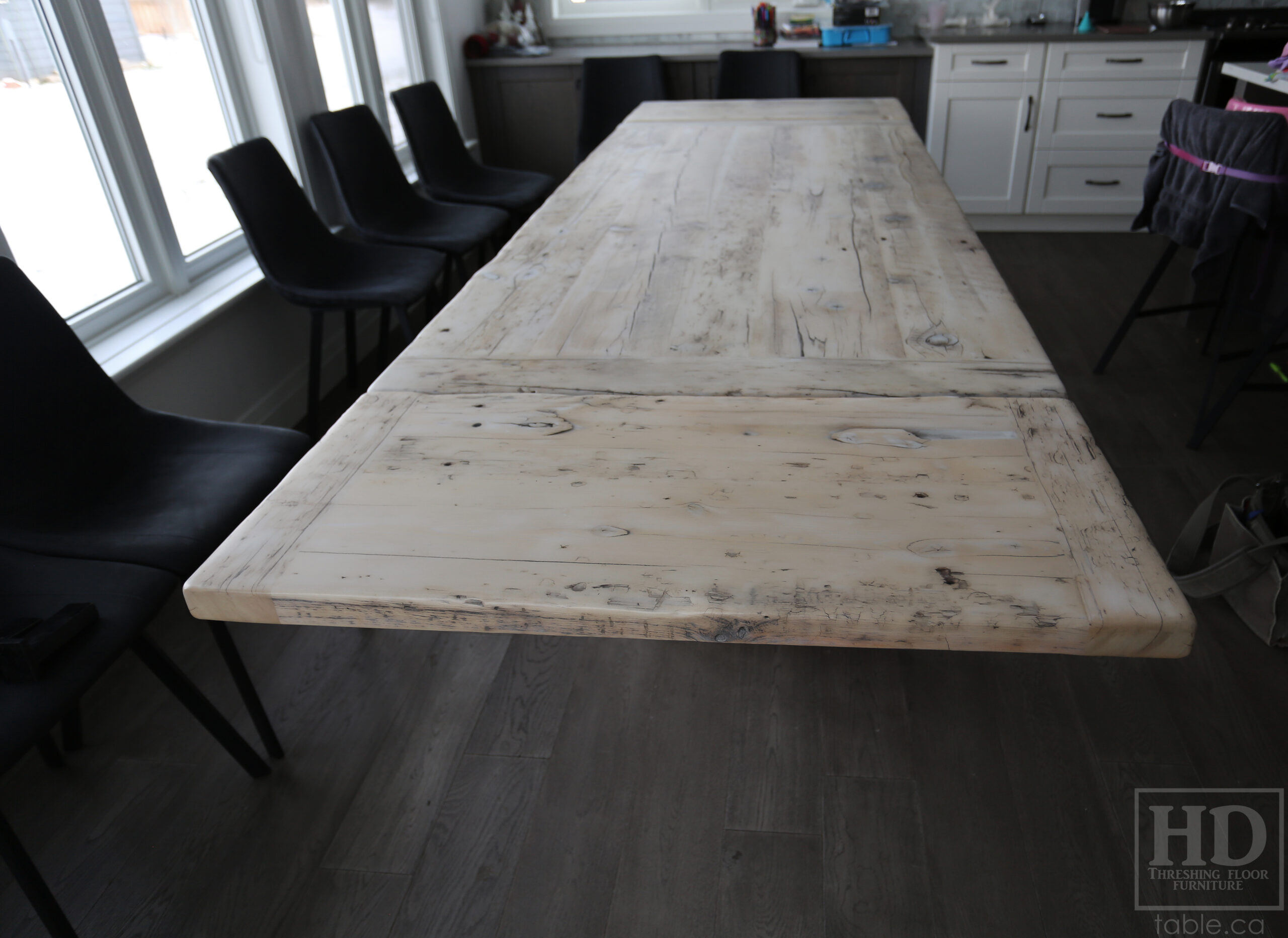 7’ Reclaimed Ontario Barnwood Table we made for a Kingsville, Ontario home – 39” wide – Modern Plank Base - Old Growth Hemlock Threshing Floor Construction – Bleached Option  - Original edges & distressing maintained – Bread Edge Ends - Premium epoxy + matte polyurethane finish – Two 18” Leaf Extensions - www.table.ca