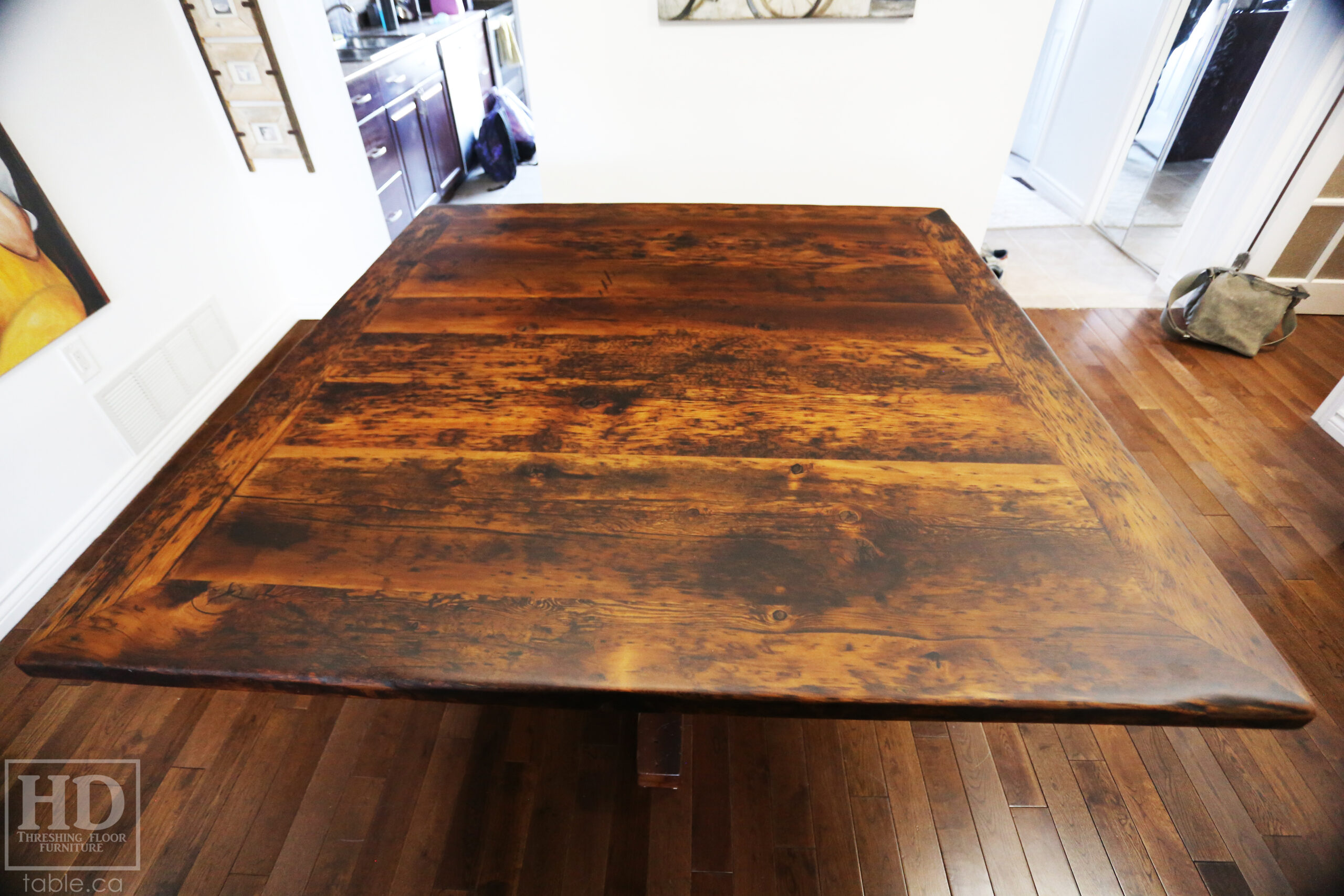 Project summary: 60” x 60” Square Reclaimed Ontario Barnwood Table we made for an Etobicoke, Ontario home – Hand-Hewn Beam Pedestal Base - Old Growth Hemlock Threshing Floor Construction – Original edges & distressing maintained – Bread Edge Ends - Premium epoxy + matte polyurethane finish – www.table.ca