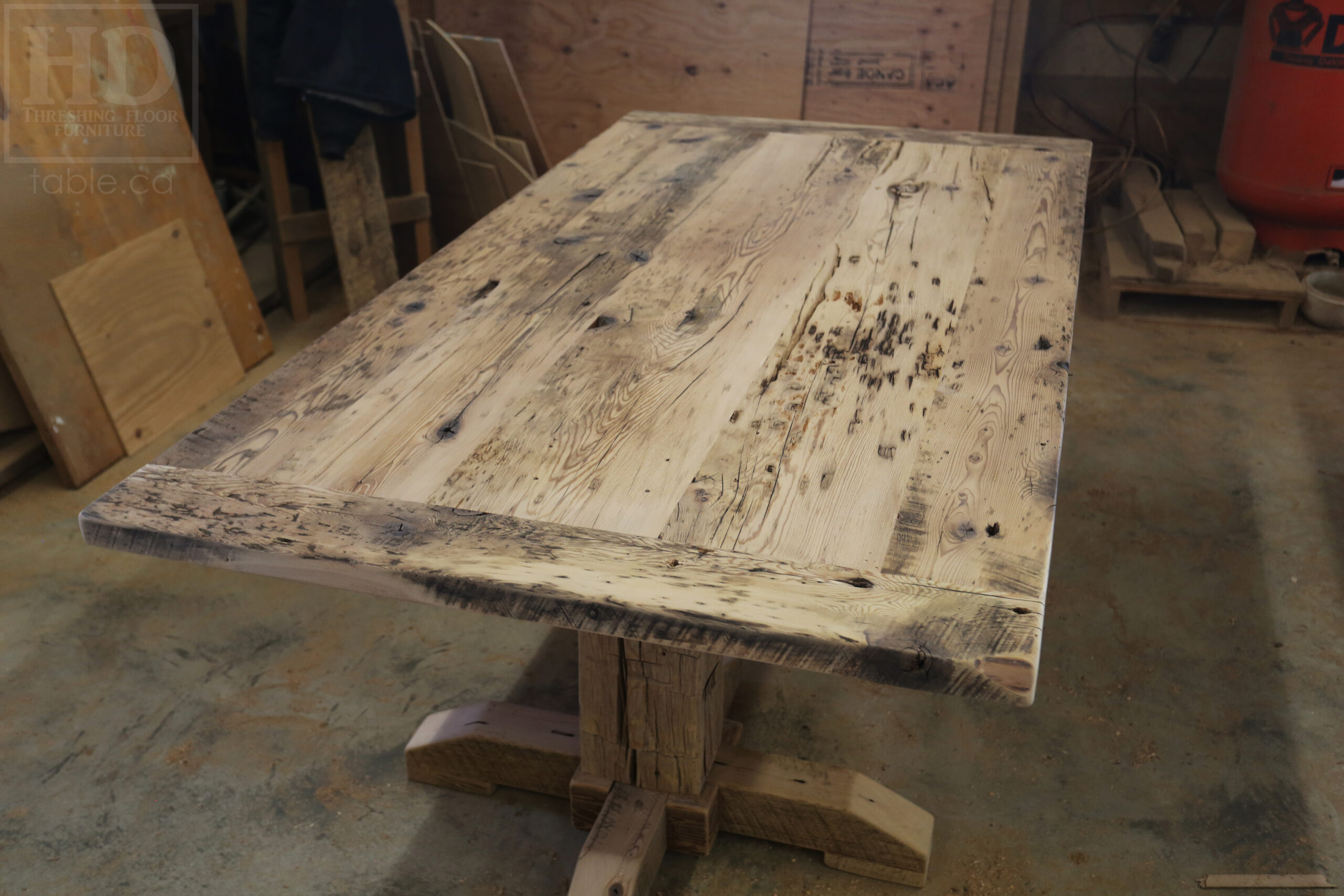 80” Reclaimed Ontario Barnwood Table we made for a Oakville, Ontario home – Double Hand Hewn Beam Posts Base  - Old Growth Hemlock Threshing Floor Construction – Original edges & distressing maintained – Bread Edge Ends - Premium epoxy + satin polyurethane finish - www.table.ca