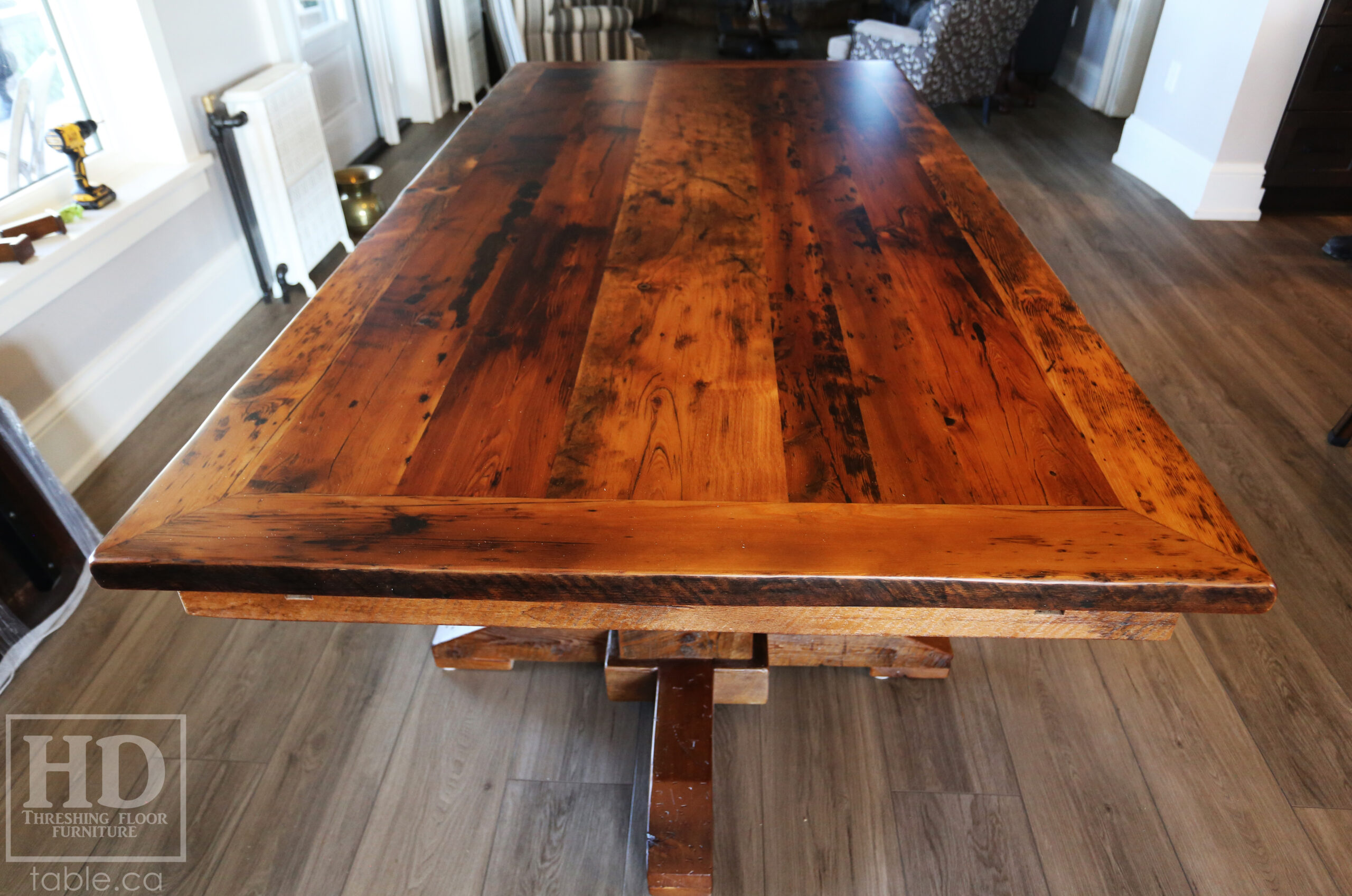8’ Reclaimed Ontario Barnwood Table we made for a Beamsville, Ontario home – 48” wide –  Hand Hewn Pedestals Base - Old Growth Hemlock Threshing Floor Construction - Original edges & distressing maintained – Bread Edge Ends – Premium epoxy + matte polyurethane finish – [2] 18” leaf extensions – [2] Drawers – Lee Valley Hardware Cast Brass Handle - www.table.ca