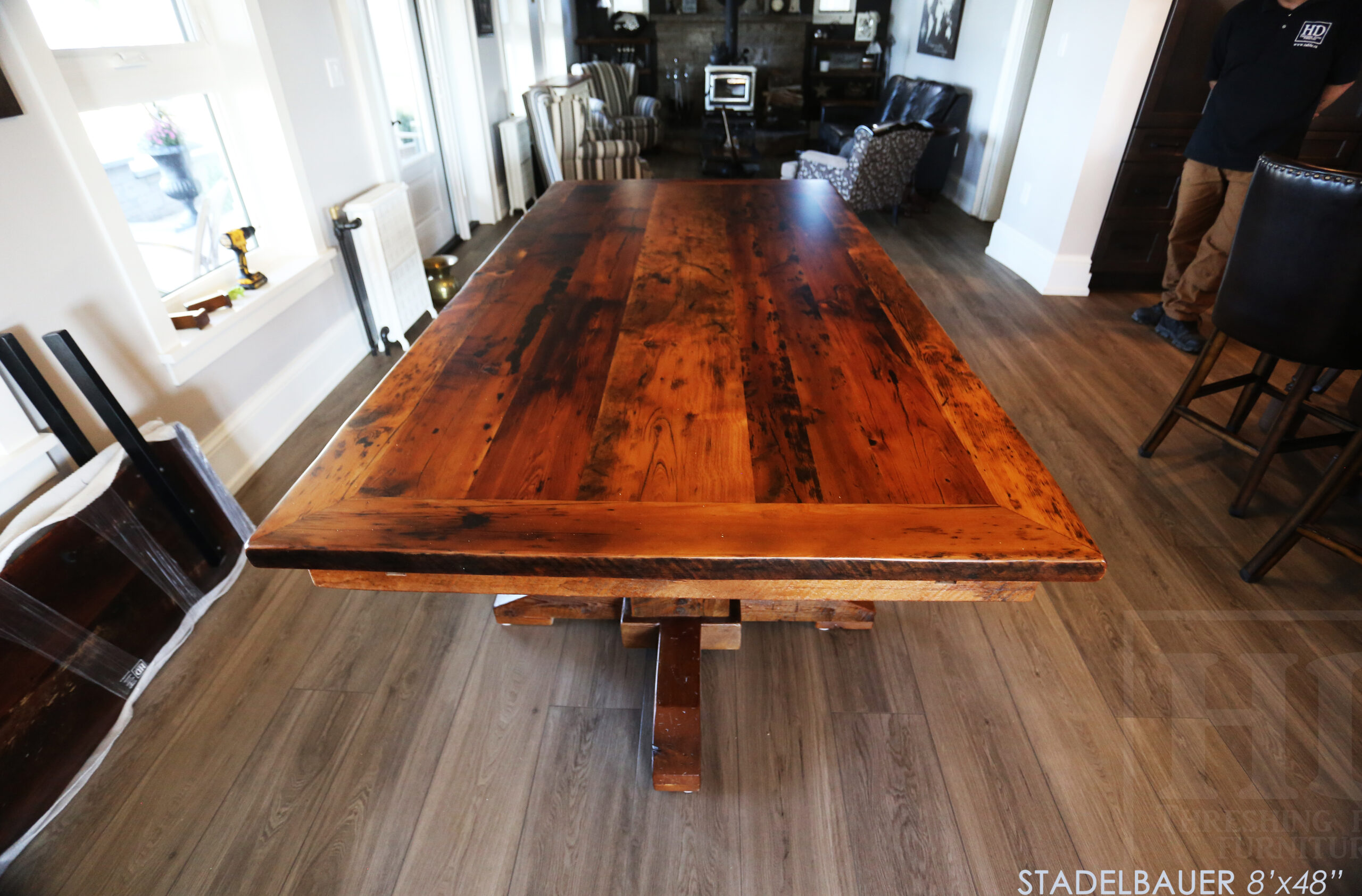 8â€™ Reclaimed Ontario Barnwood Table we made for a Beamsville, Ontario home â€“ 48â€ wide â€“  Hand Hewn Pedestals Base - Old Growth Hemlock Threshing Floor Construction - Original edges & distressing maintained â€“ Bread Edge Ends â€“ Premium epoxy + matte polyurethane finish â€“ [2] 18â€ leaf extensions â€“ [2] Drawers â€“ Lee Valley Hardware Cast Brass Handle - www.table.ca