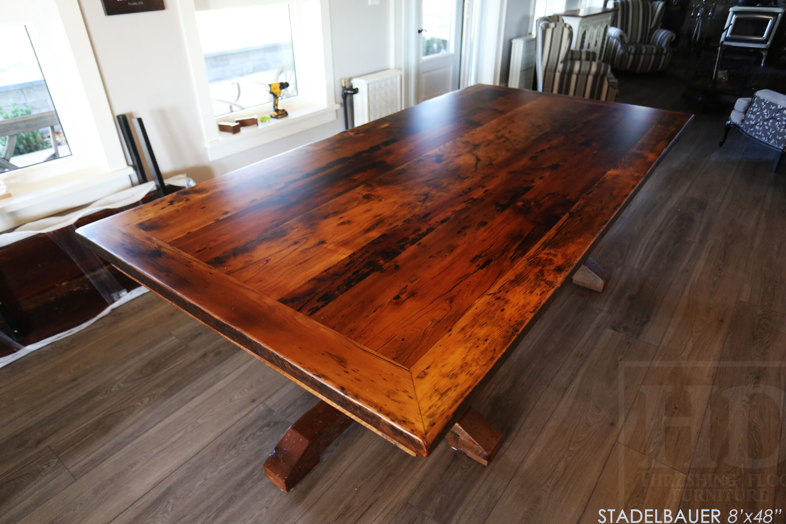 8’ Reclaimed Ontario Barnwood Table we made for a Beamsville, Ontario home – 48” wide –  Hand Hewn Pedestals Base - Old Growth Hemlock Threshing Floor Construction - Original edges & distressing maintained – Bread Edge Ends – Premium epoxy + matte polyurethane finish – [2] 18” leaf extensions – [2] Drawers – Lee Valley Hardware Cast Brass Handle - www.table.ca