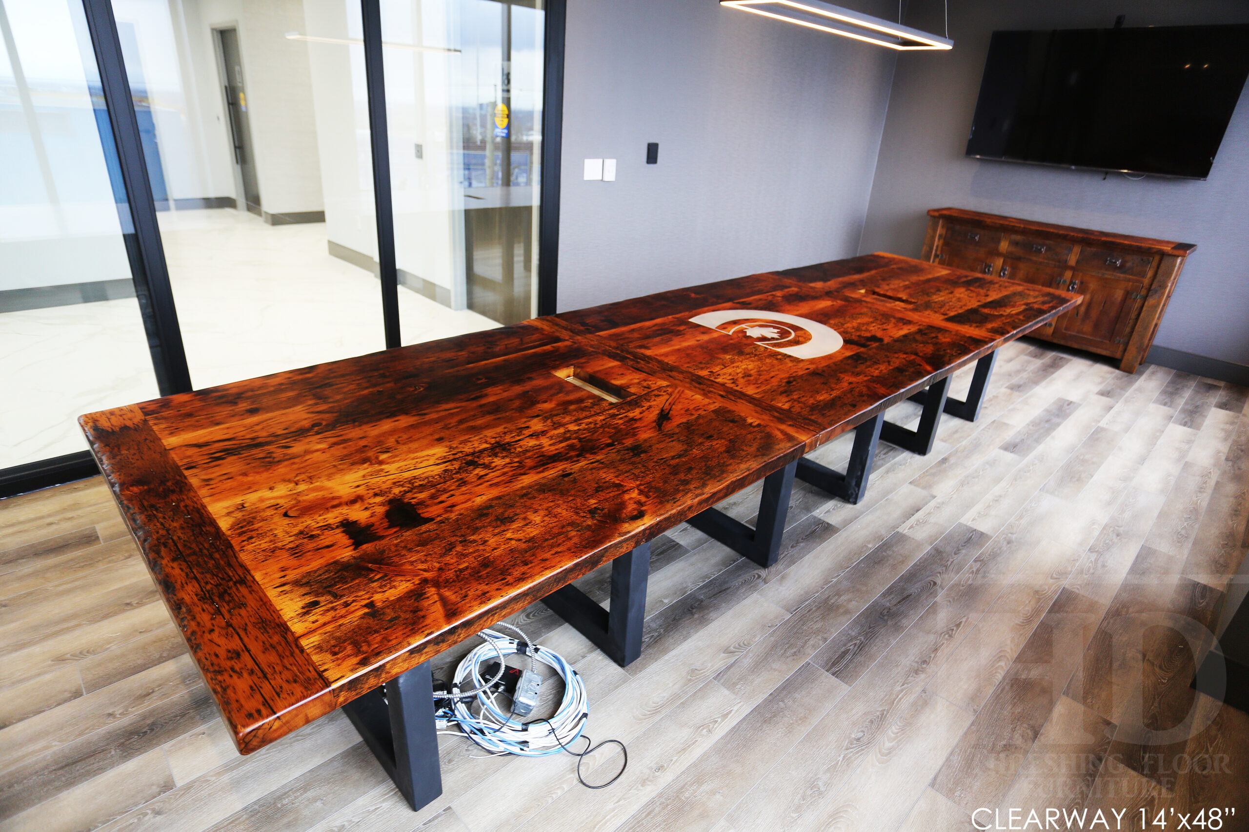 Project details: 14â€™ Reclaimed Ontario Barnwood Boardroom Table we made for a Maple, Ontario office â€“ 48â€ wide â€“  Matte Black U Shaped Base  - Old Growth Pine Threshing Floor Construction - Original edges & distressing maintained â€“ Bread Edge Ends â€“ Premium epoxy + matte polyurethane finish - www.table.ca
