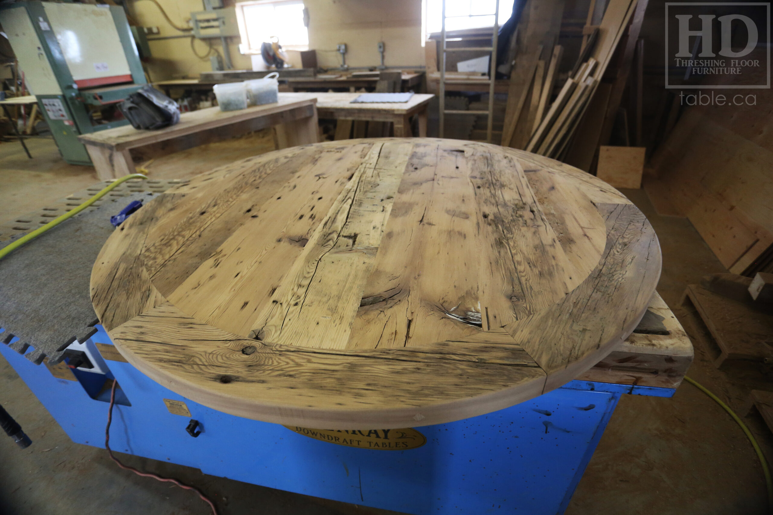 54â€ Reclaimed Ontario Barnwood Round Table â€“ Trestle Base - Old Growth Pine Threshing Floor Construction - Original edges & distressing maintained â€“ Circular Bread Edging â€“ Premium epoxy + satin polyurethane finish - www.table.ca