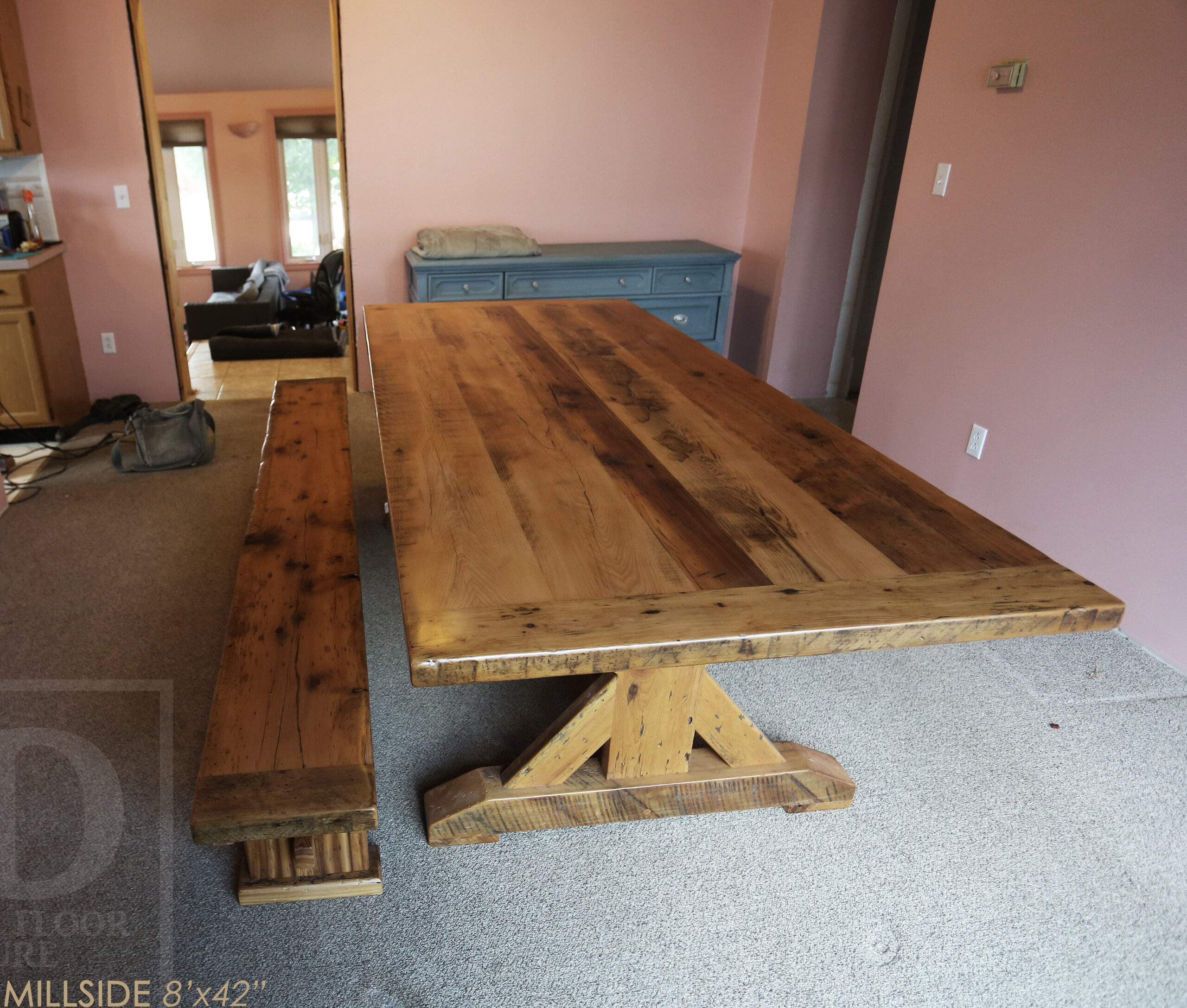 Project summary: 8â€™ Reclaimed Ontario Barnwood Table we made for an Innerkip, Ontario home â€“ 42â€ wide â€“ Sawbuck Base - Old Growth Hemlock Threshing Floor Construction â€“ Greytone Option  - Original edges & distressing maintained â€“ Bread Edge Ends - Premium epoxy + satin polyurethane finish â€“ 8â€™ Reclaimed Wood Bench [matching] - www.table.ca