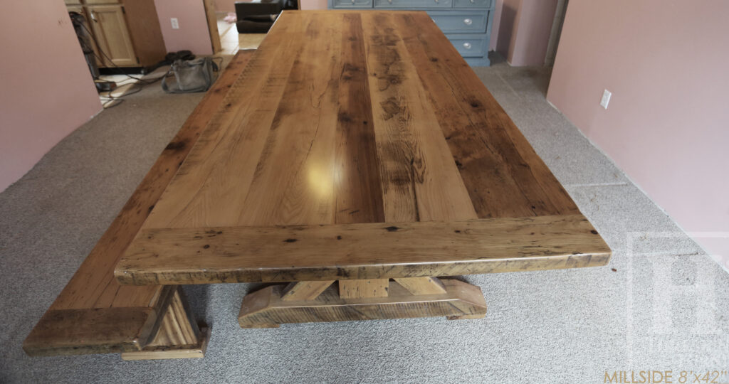 Project summary: 8â€™ Reclaimed Ontario Barnwood Table we made for an Innerkip, Ontario home â€“ 42â€ wide â€“ Sawbuck Base - Old Growth Hemlock Threshing Floor Construction â€“ Greytone Option  - Original edges & distressing maintained â€“ Bread Edge Ends - Premium epoxy + satin polyurethane finish â€“ 8â€™ Reclaimed Wood Bench [matching] - www.table.ca