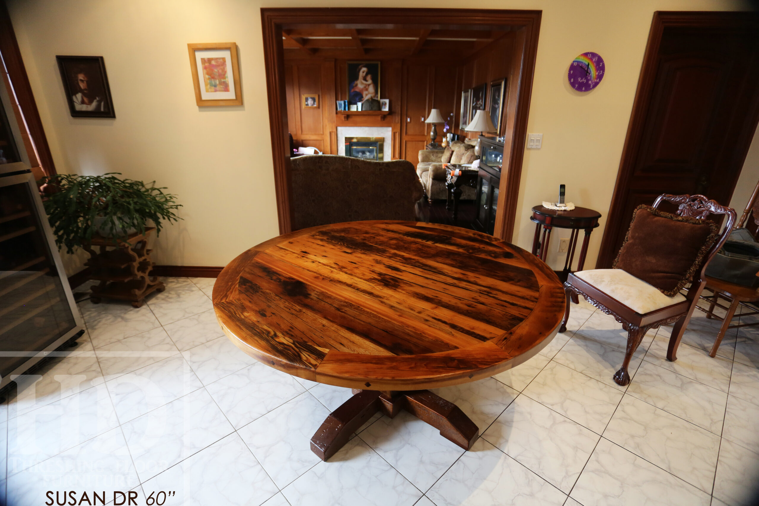 Project Summary: 60” Round Reclaimed Ontario Barnwood Table we made for a Hamilton, Ontario home – Hand Hewn Beam Pedestal Base - Old Growth Hemlock Threshing Floor Construction - Original edges & distressing maintained – Bread Edge Boards – Premium epoxy + satin polyurethane finish - www.table.ca