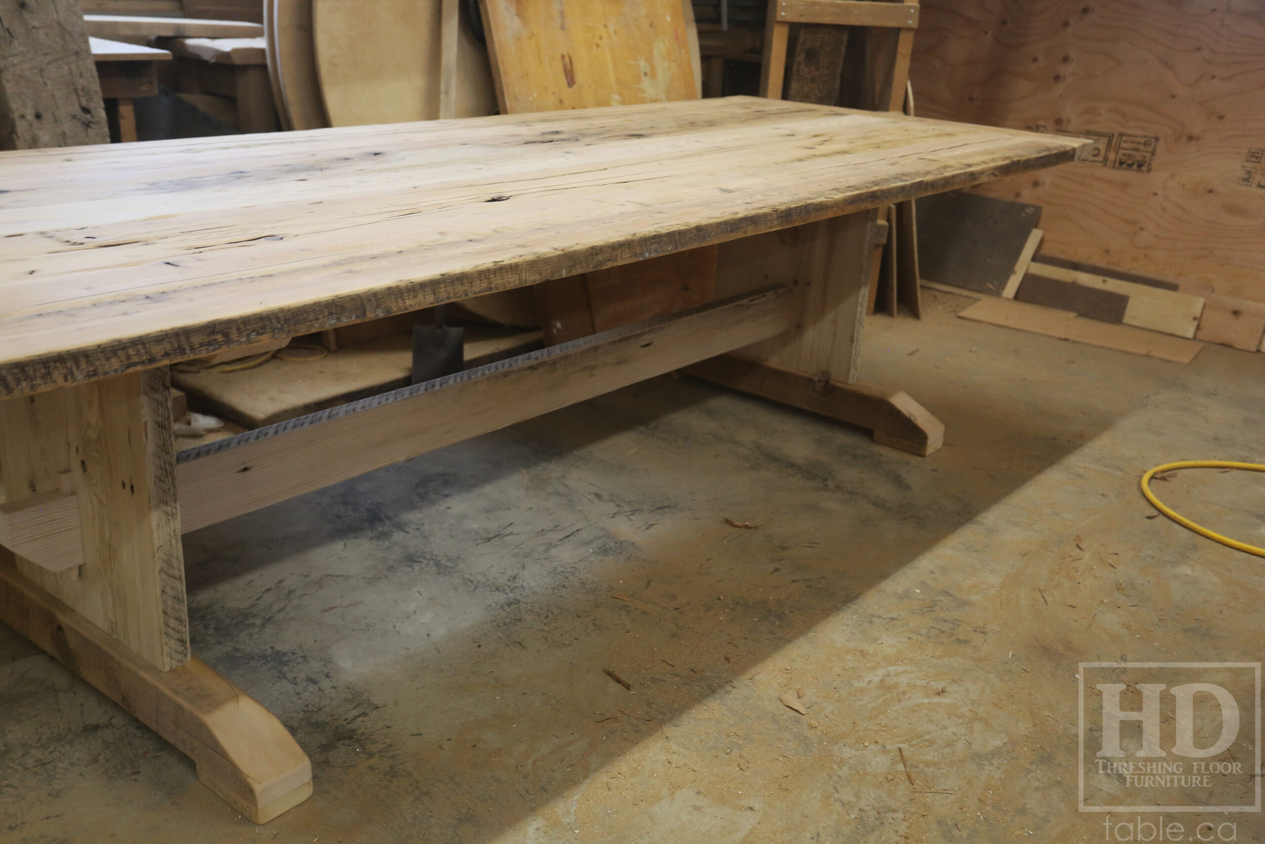 10’ Reclaimed Ontario Barnwood Trestle Table we made for an Oakville, Ontario home – 44” wide - Trestle Base [Painted Black] - Old Growth Hemlock Threshing Floor Construction - Original edges & distressing maintained – Bread Edge Board Ends – Premium epoxy + matte polyurethane finish - www.table.ca