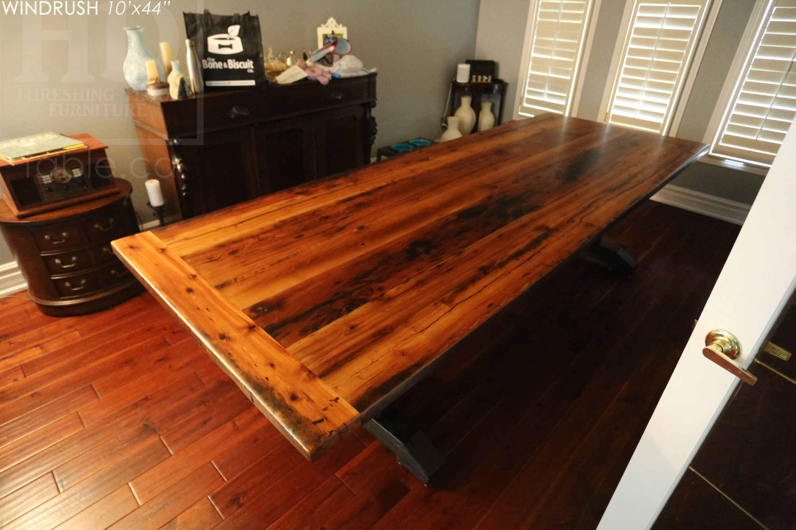 10’ Reclaimed Ontario Barnwood Trestle Table we made for an Oakville, Ontario home – 44” wide - Trestle Base [Painted Black] - Old Growth Hemlock Threshing Floor Construction - Original edges & distressing maintained – Bread Edge Board Ends – Premium epoxy + matte polyurethane finish - www.table.ca