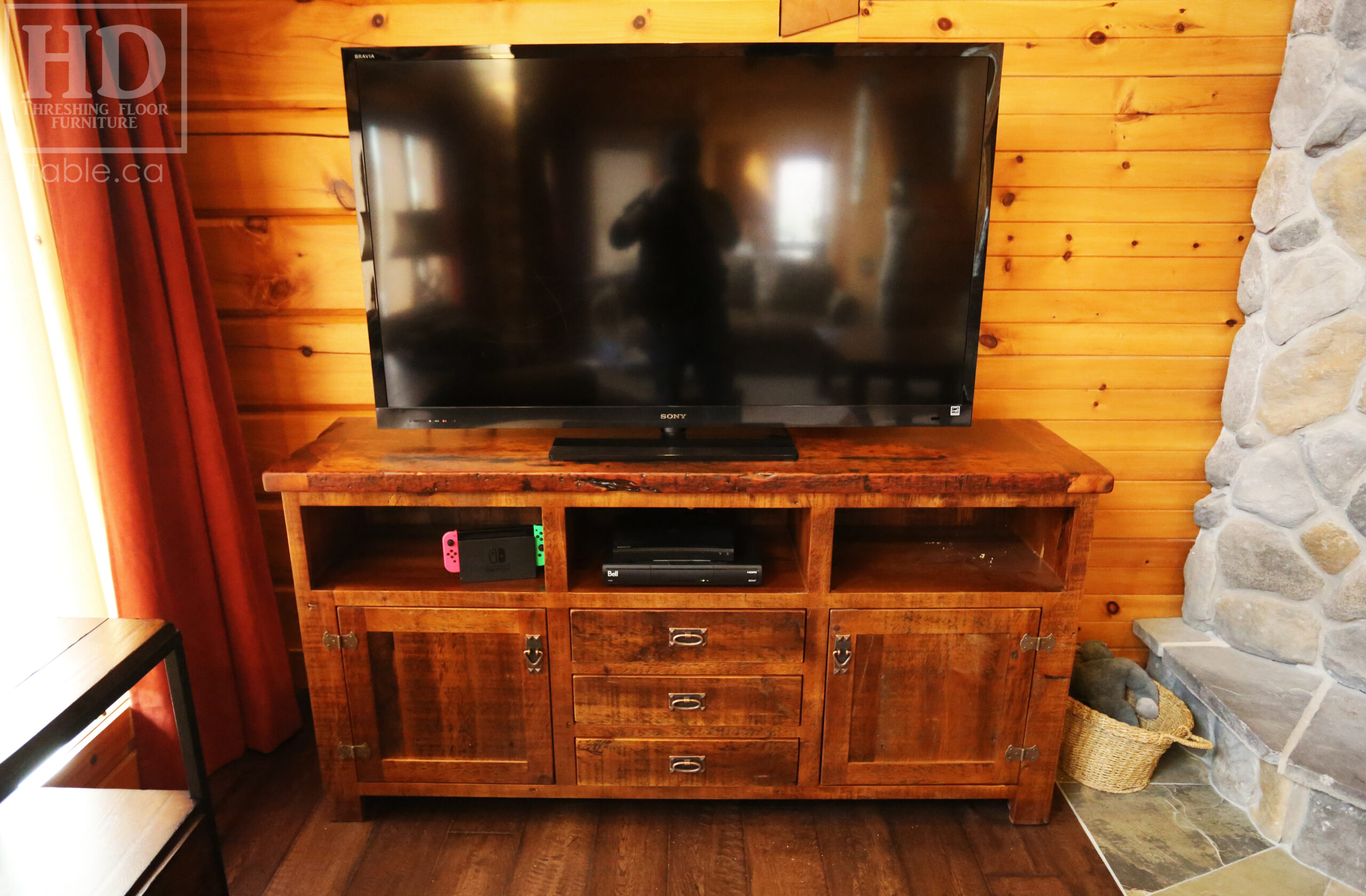 6’ Reclaimed Ontario Barnwood TV Unit we made for a Vienna, Ontario home – 18” deep – 36” height – Open Shelving – Centre 3 Drawers / 2 Outside Bottom Doors - Old Growth Pine Threshing Floor & Grainery Board Construction - Original edges & distressing maintained – Bread Edge Board Ends – Premium epoxy + matte polyurethane finish – Mission Cast Brass Lee Valley Hardware - www.table.ca