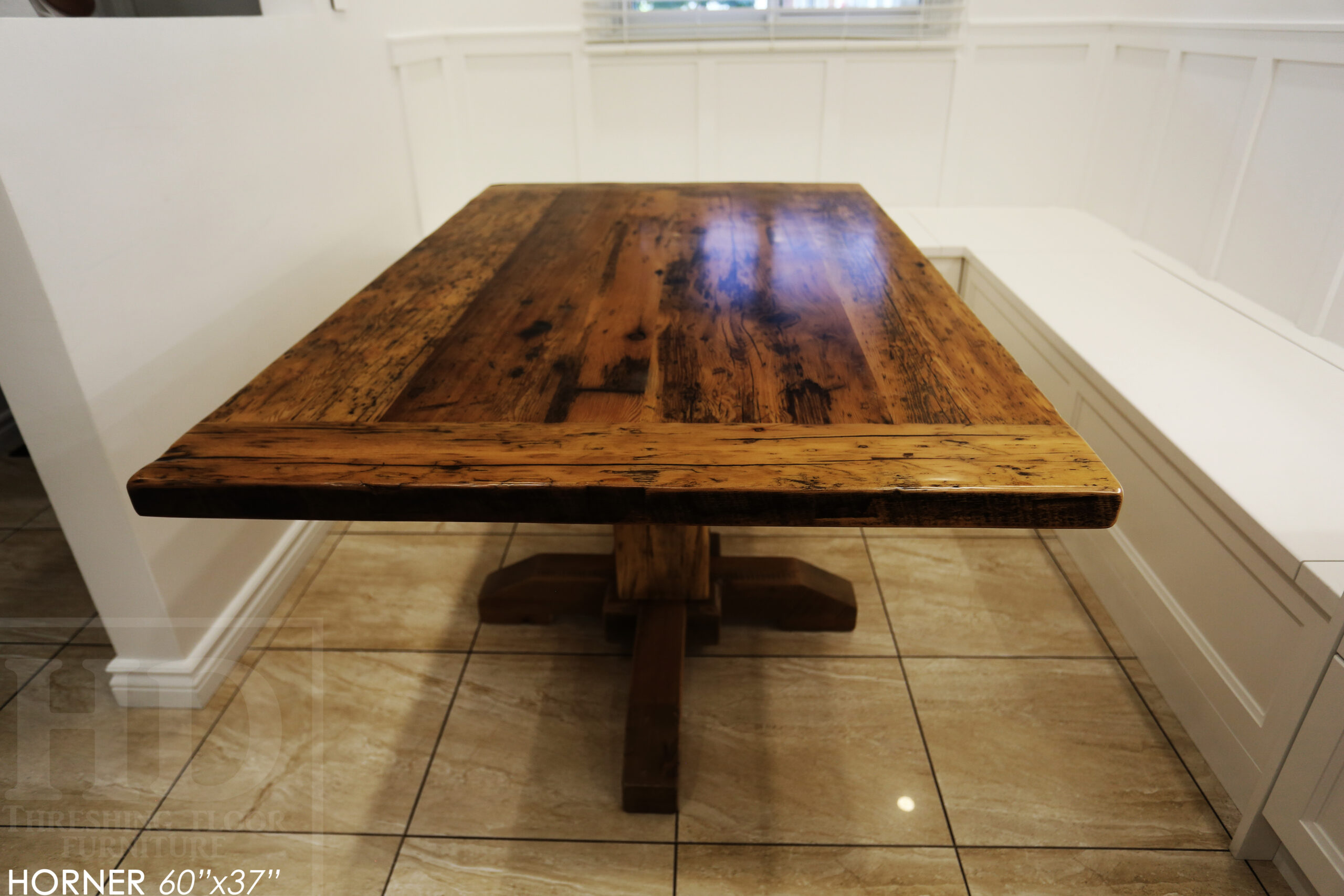 Project Summary: 60â€ Reclaimed Ontario Barnwood Coffee Table â€“ 37â€ wide â€“ 30â€ height â€“ Hand-Hewn Beam Pedestal Base -  Old Growth Hemlock Threshing Floor Construction - Original edges & distressing maintained â€“ Bread Edge Boards â€“ Greytone Option - Premium epoxy + satin polyurethane finish - www.table.ca