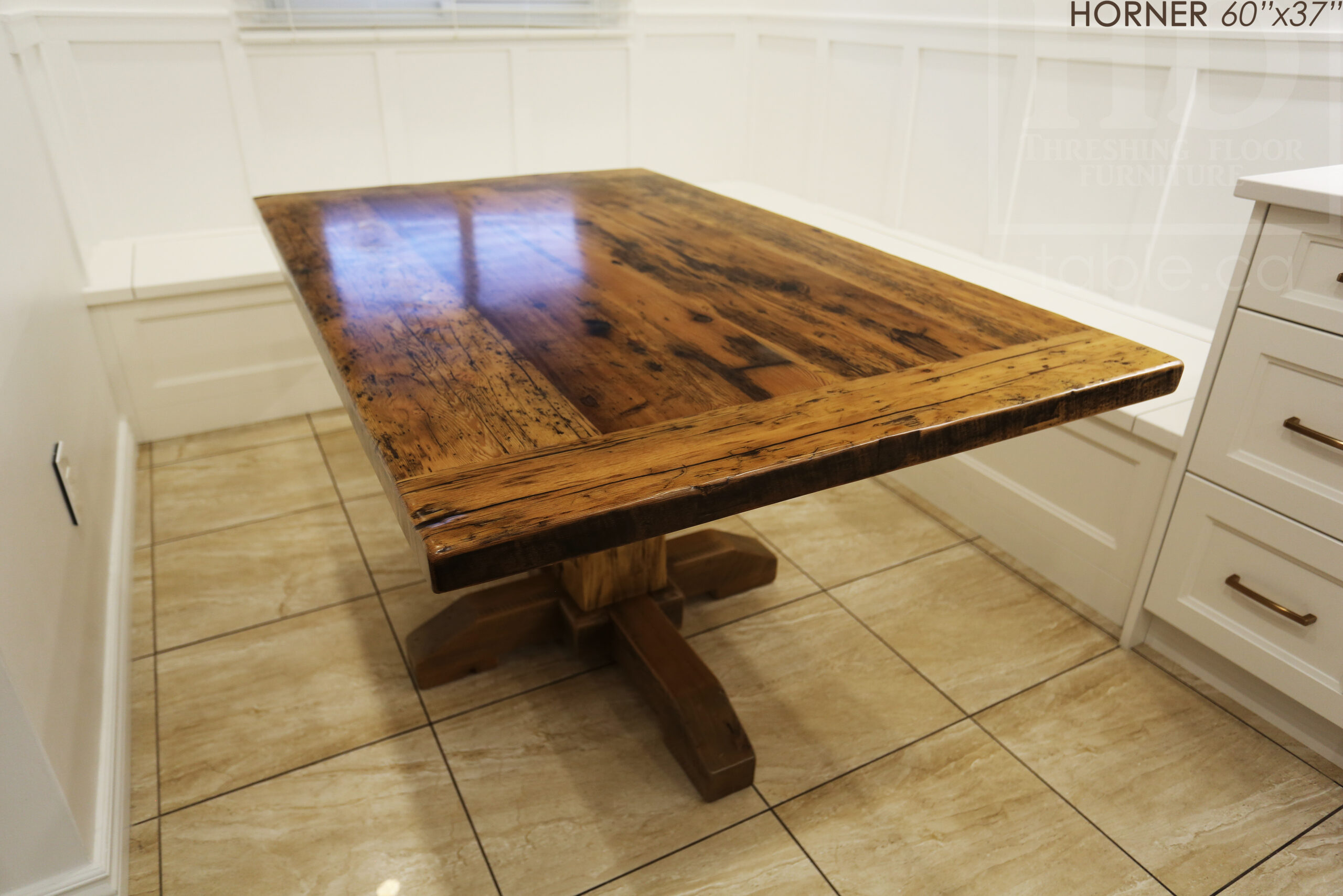 Project Summary: 60â€ Reclaimed Ontario Barnwood Coffee Table â€“ 37â€ wide â€“ 30â€ height â€“ Hand-Hewn Beam Pedestal Base -  Old Growth Hemlock Threshing Floor Construction - Original edges & distressing maintained â€“ Bread Edge Boards â€“ Greytone Option - Premium epoxy + satin polyurethane finish - www.table.ca