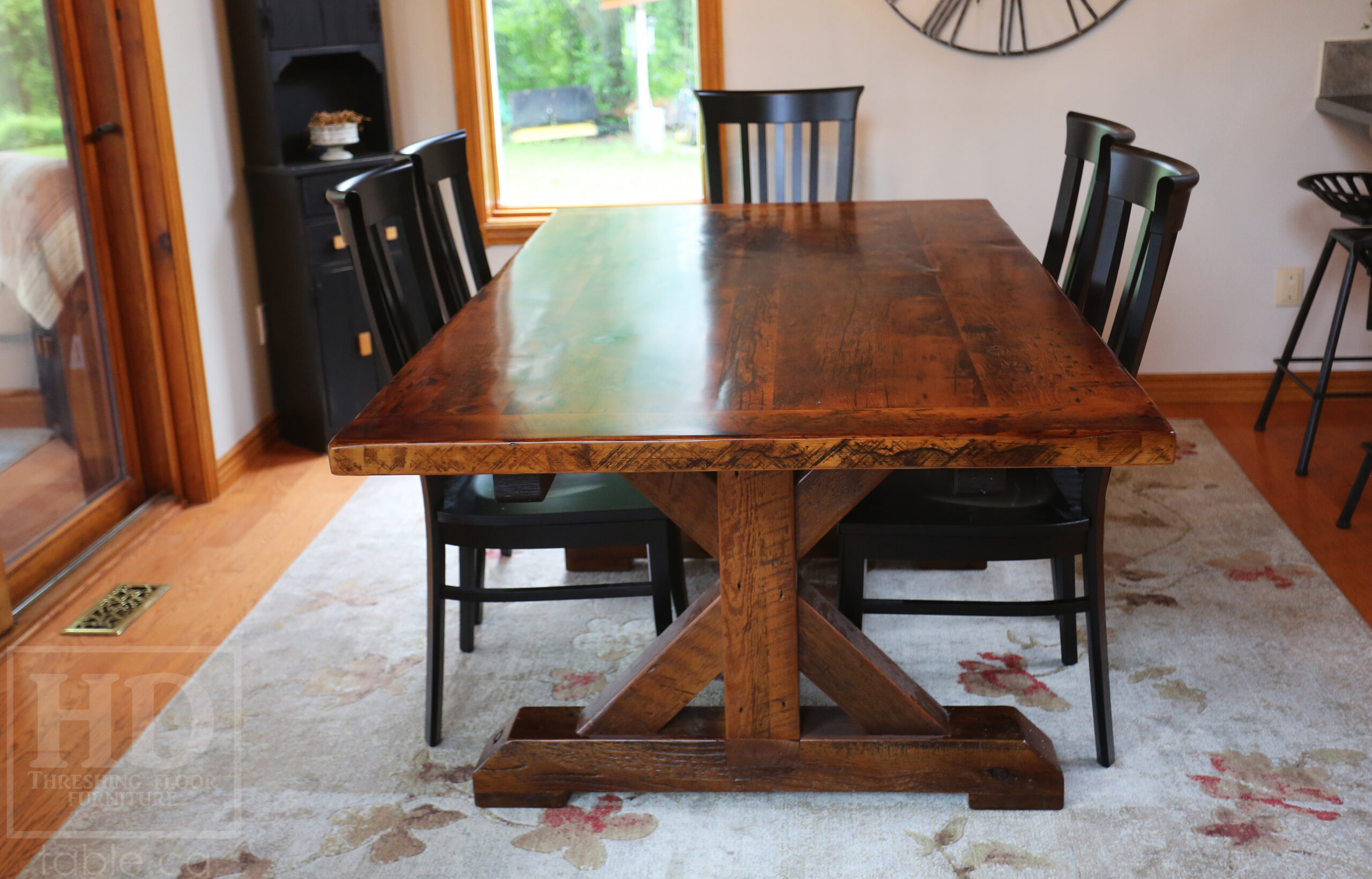 Project Summary: 6.5’ Reclaimed Barnwood Table we made for a Pakenham, Ontario home – 42” wide - Sawbuck Beam Option Base - Old Growth Hemlock Threshing Floor 2” Construction - Original edges & distressing maintained – Bread Edge Boards – Premium epoxy [light coating / less thick option] + satin polyurethane finish – One 12” Leaf – Wormy Maple Athena Chairs / Painted Solid Black - www.table.ca