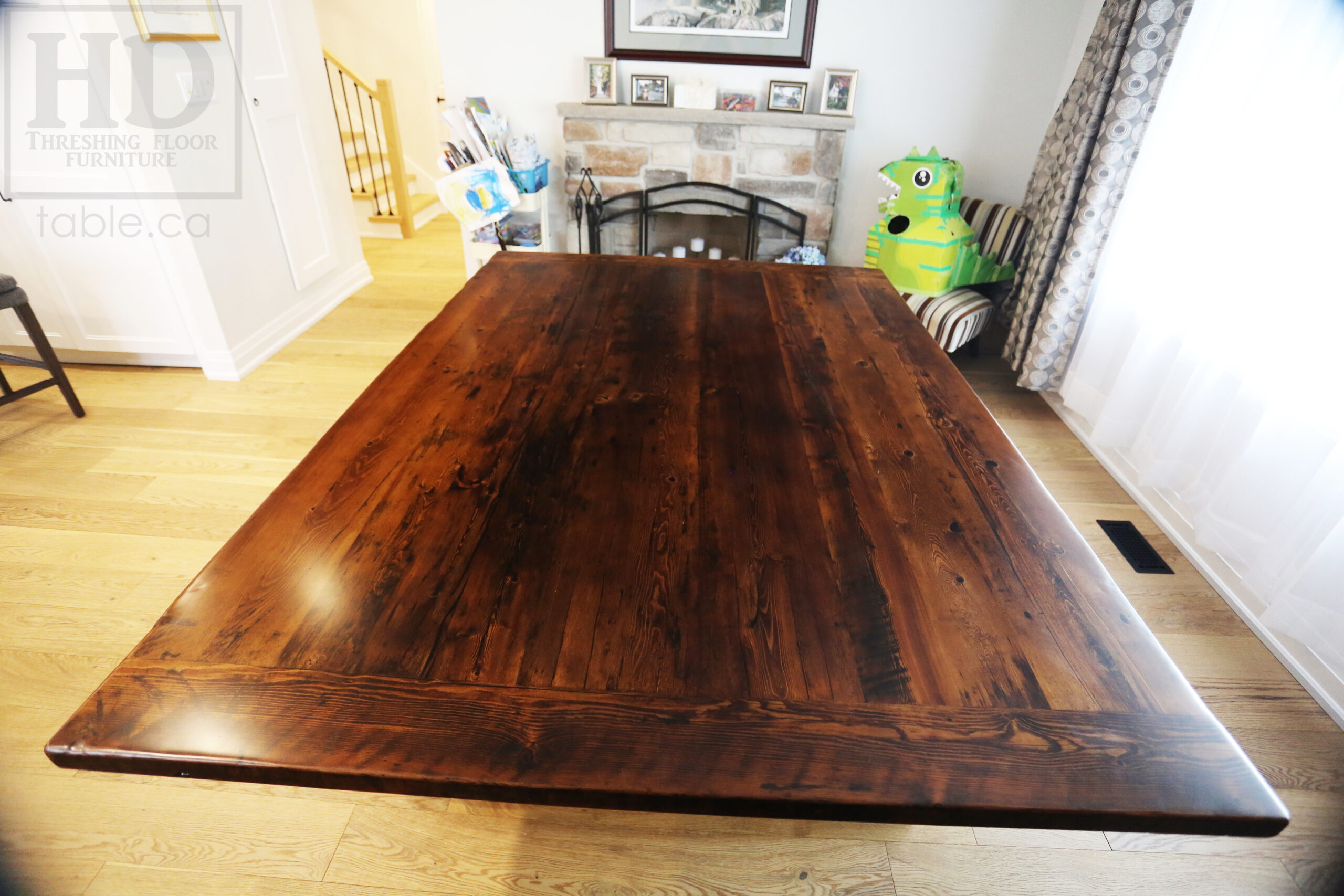 Project Summary: 7’ Reclaimed Barnwood Table we made for a Toronto, Ontario home – 60” wide – Sawbuck Base - Old Growth Ontario Hemlock Threshing Floor Construction - Original edges & distressing maintained – Bread Edge Boards – Premium epoxy + satin polyurethane finish -  www.table.ca