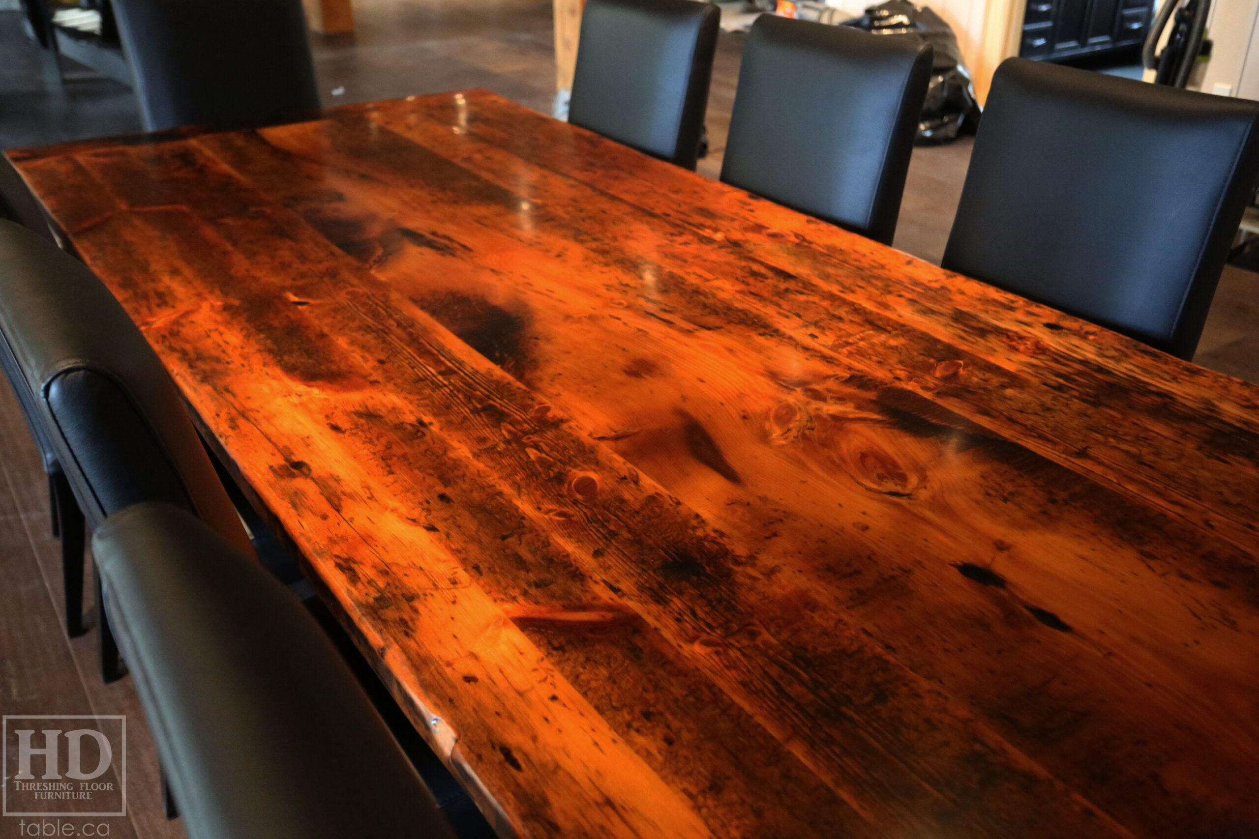 Project Summary: 12â€™ Reclaimed Ontario Barnwood Harvest Table â€“ Tapered with a Notch Windbrace Beam Legs - Old Growth Hemlock Threshing Floor 2â€ Construction - Original edges & distressing maintained â€“ Bread Edge Boards â€“- Premium epoxy + satin polyurethane finish - www.table.ca