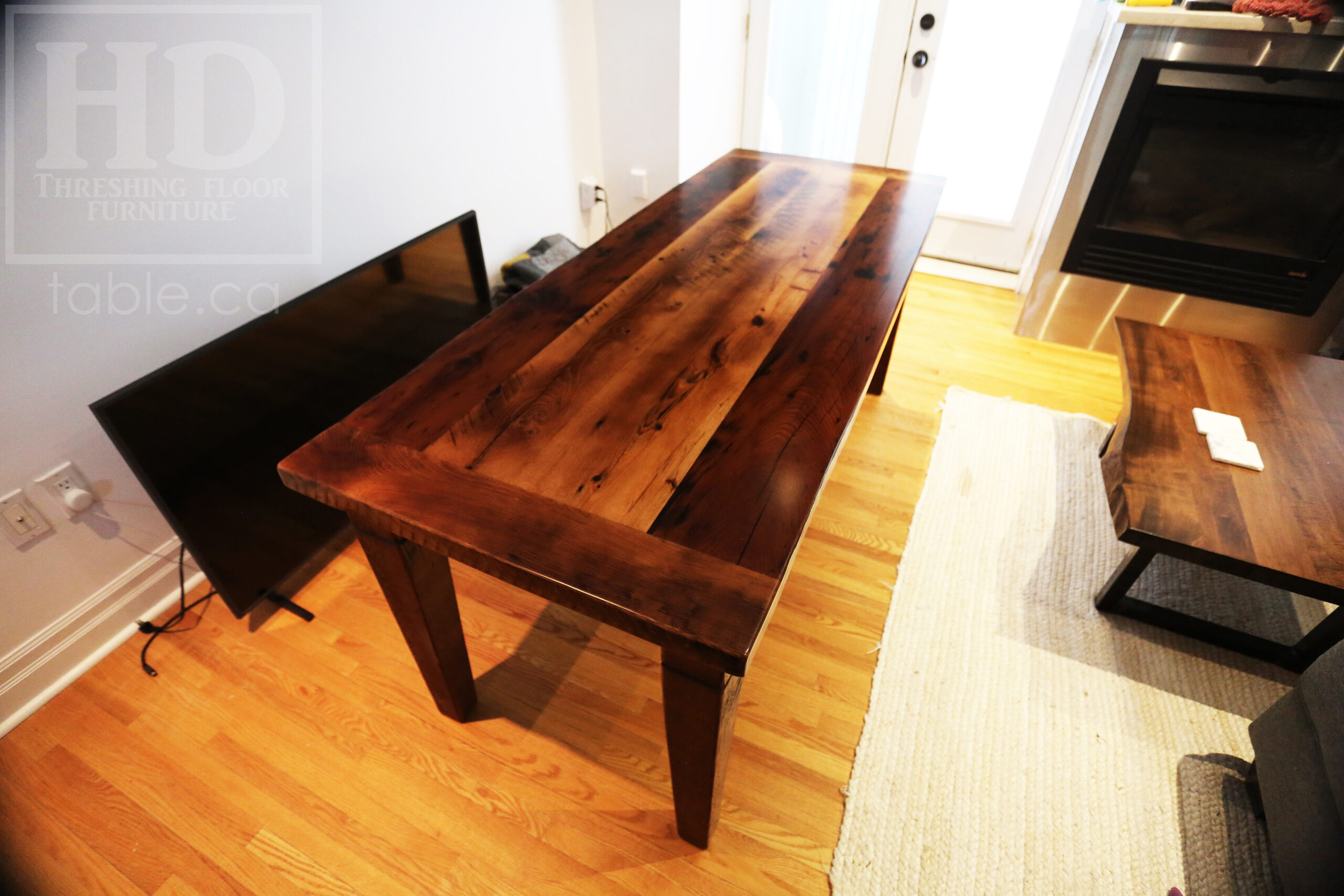 6’ Ontario Barnwood Harvest Table we made for a Toronto, Ontario Home – 28” wide – Harvest Base / Tapered with a Notch Windbrace Beam Legs - Old Growth Hemlock Threshing Floor Construction - Original edges & distressing maintained – Bread Edge Board Ends – Premium epoxy + satin polyurethane finish - www.table.ca