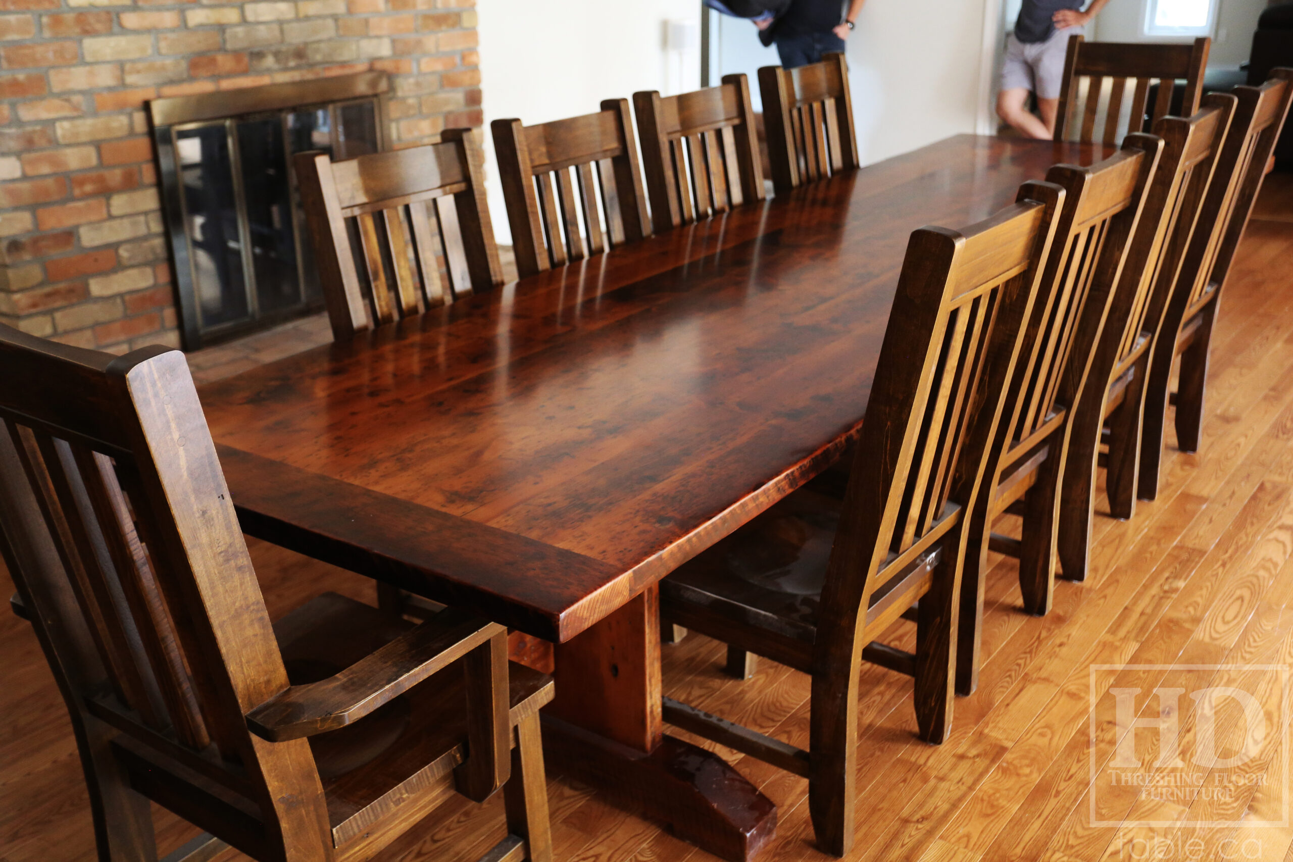 Project Summary: 12’ Reclaimed Ontario Barnwood Table we made for a Goodwood, Ontario home – 42” wide – Trestle Base - Old Growth Hemlock Threshing Floor Construction - Original edges & distressing maintained – Bread Edge Boards - Premium epoxy + satin polyurethane finish – 10 Strongback Chairs / Wormy Maple / Stained Colour of Table / Polyurethane clearcoat finish - www.table.ca