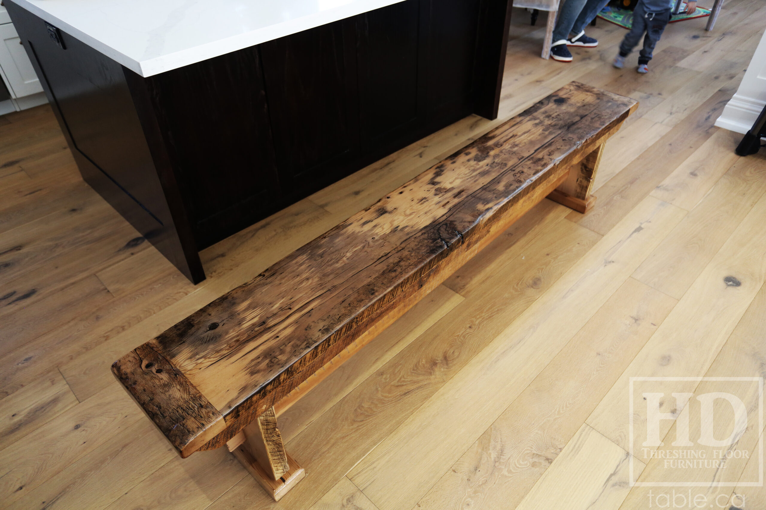 Project Summary: 7’ Reclaimed Ontario Barnwood Table we made for an Oakville, Ontario Home – 42” wide – Sawbuck Base - Old Growth Hemlock Threshing Floor Construction - Original edges & distressing maintained – Bread Edge Boards – Greytone Option - Premium epoxy + satin polyurethane finish – One 18” Leaf – 7’ [matching] Bench - www.table.ca