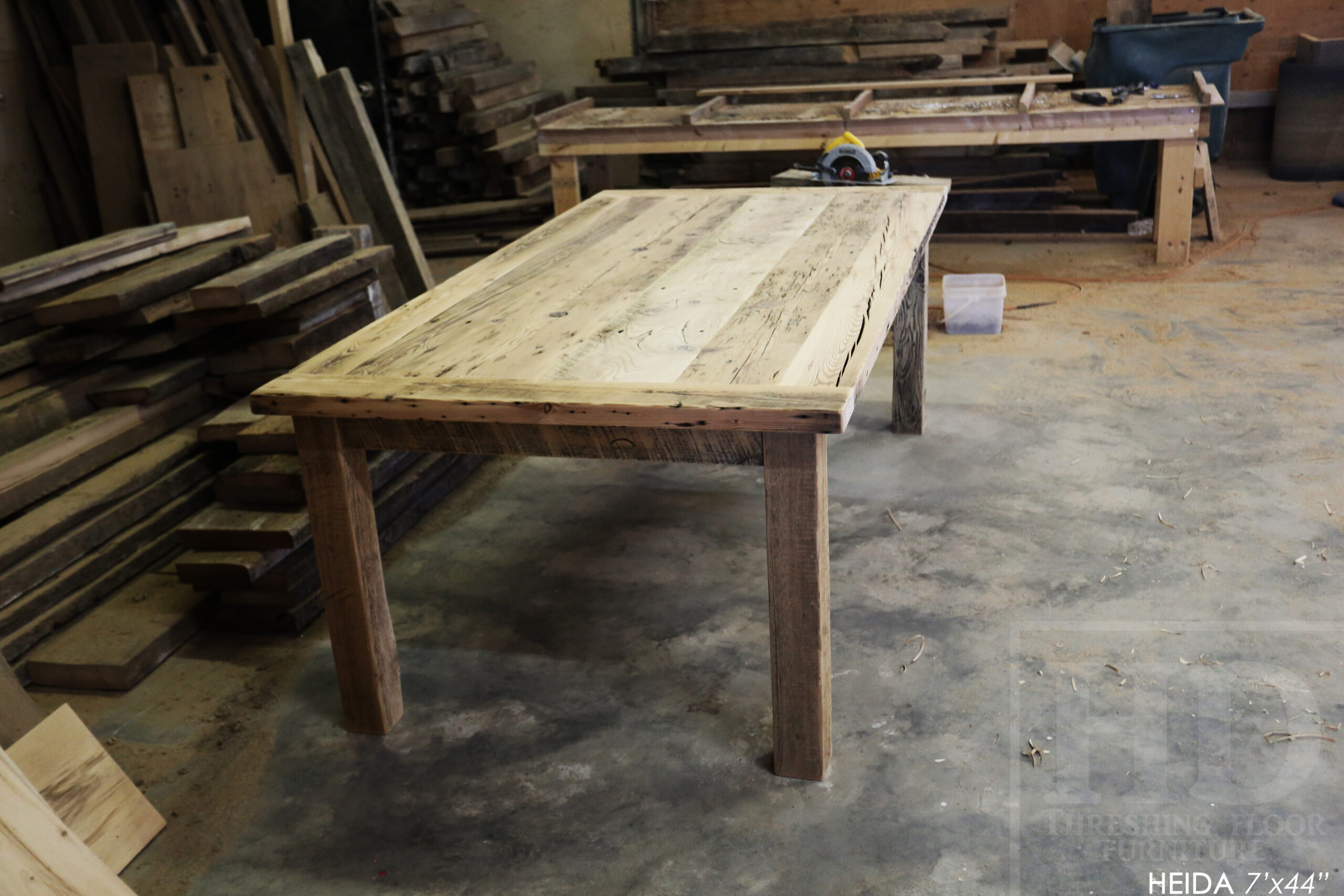 7â€™ Ontario Barnwood Table â€“ 42â€ wide â€“ Harvest Base: Straight 4â€x4â€ Windbrace Beam Legs - Old Growth Hemlock Threshing Floor Construction - Original edges & distressing maintained â€“ 3â€ skirting - Bread Edge Boards â€“ Premium epoxy + satin polyurethane finish â€“ Drawer Option we made for an Ancaster Home - www.table.ca