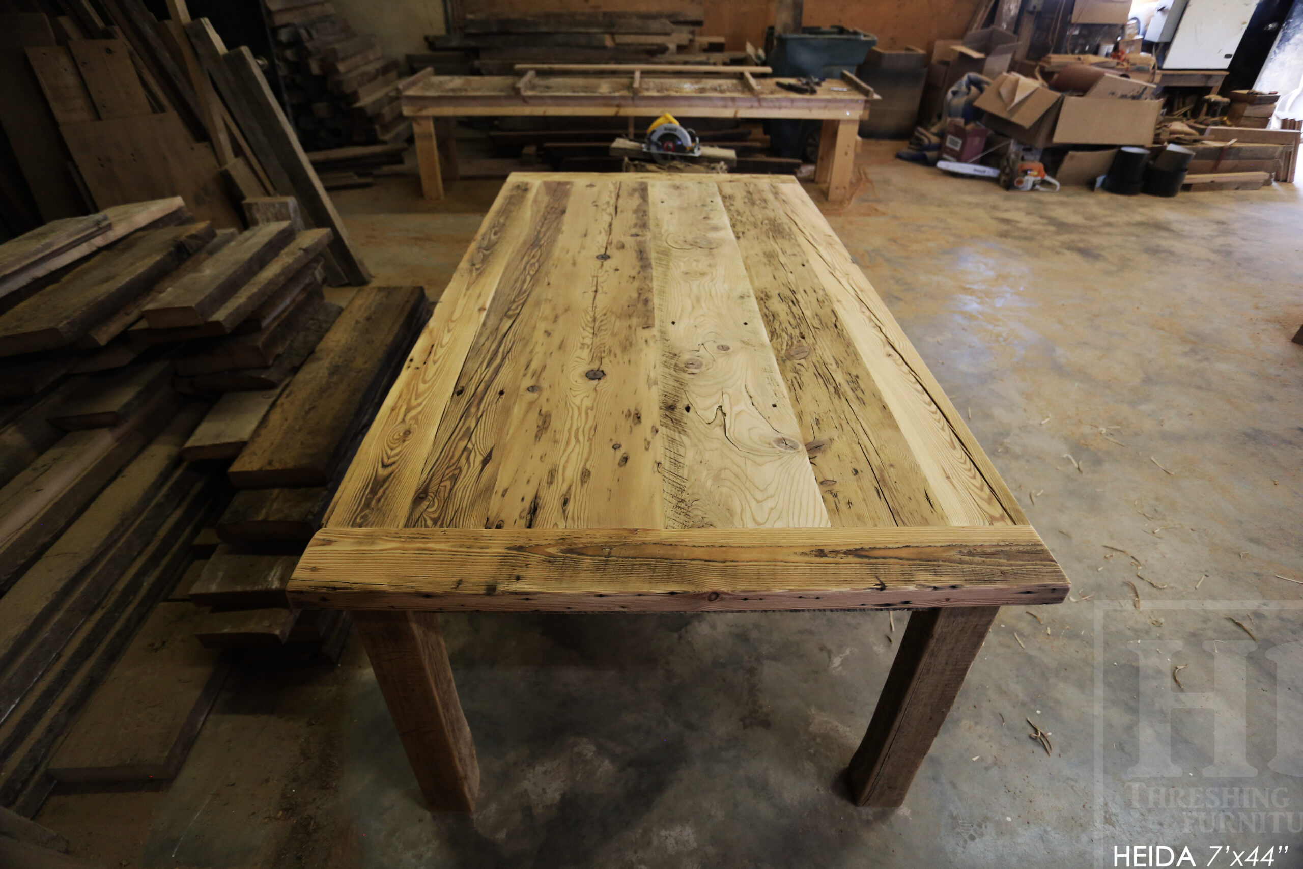 7â€™ Ontario Barnwood Table â€“ 42â€ wide â€“ Harvest Base: Straight 4â€x4â€ Windbrace Beam Legs - Old Growth Hemlock Threshing Floor Construction - Original edges & distressing maintained â€“ 3â€ skirting - Bread Edge Boards â€“ Premium epoxy + satin polyurethane finish â€“ Drawer Option we made for an Ancaster Home - www.table.ca