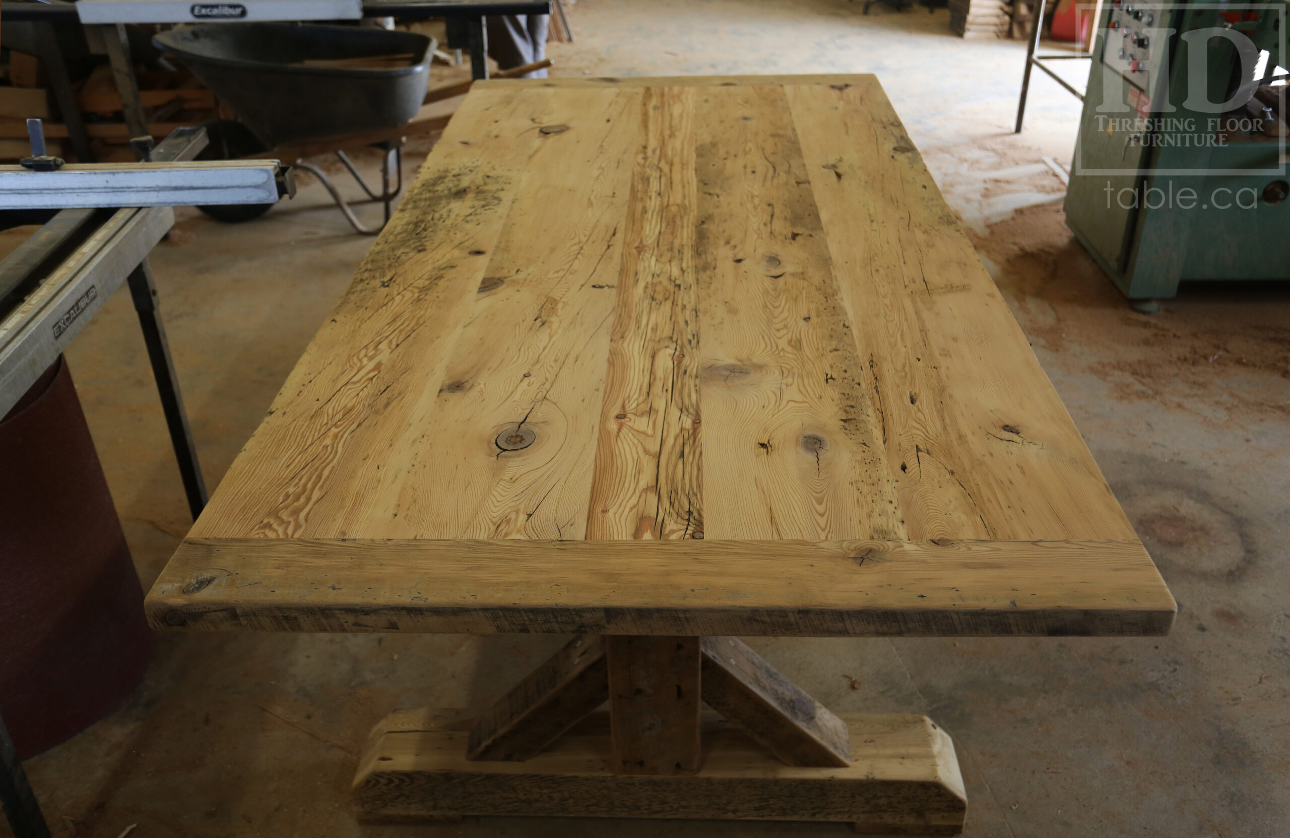 7.5’ Ontario Barnwood Table we made for a New Dundee, Ontario Home – 44” wide – Sawbuck Base [Beam Type Option] – Old Growth Reclaimed Hemlock Threshing Floor Construction – Original edges & distressing maintained -- Premium epoxy + satin polyurethane finish – www.table.ca