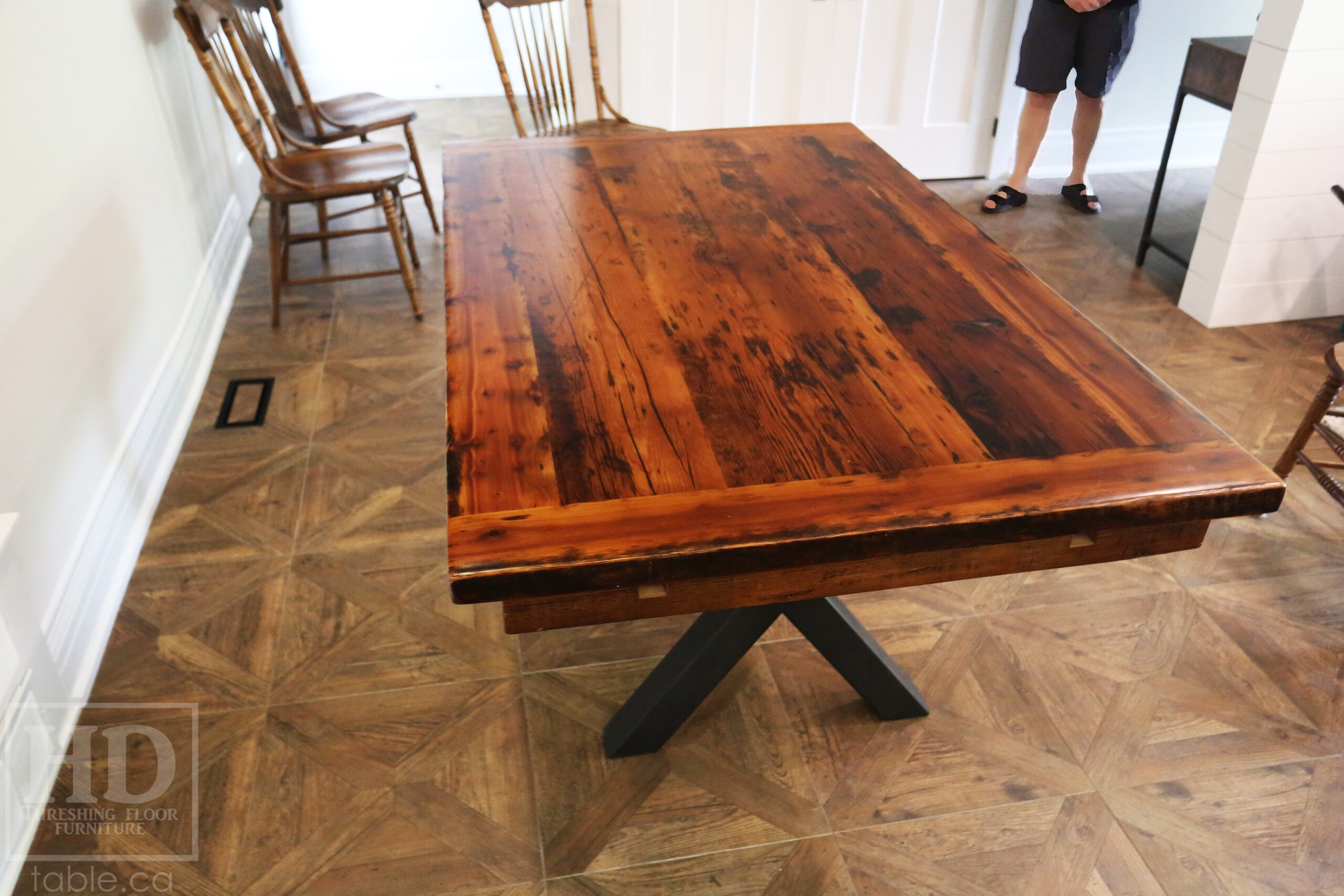 5.5â€™ Ontario Barnwood Table we made for a Dundas, Ontario Home â€“ 40â€ wide â€“ Matte Black X Shaped Base â€“ Skirting + Drawer Option - Old Growth Reclaimed Hemlock Threshing Floor Construction â€“ Original edges & distressing maintained - Premium epoxy + satin polyurethane finish â€“ Two 18â€ leaves - www.table.ca