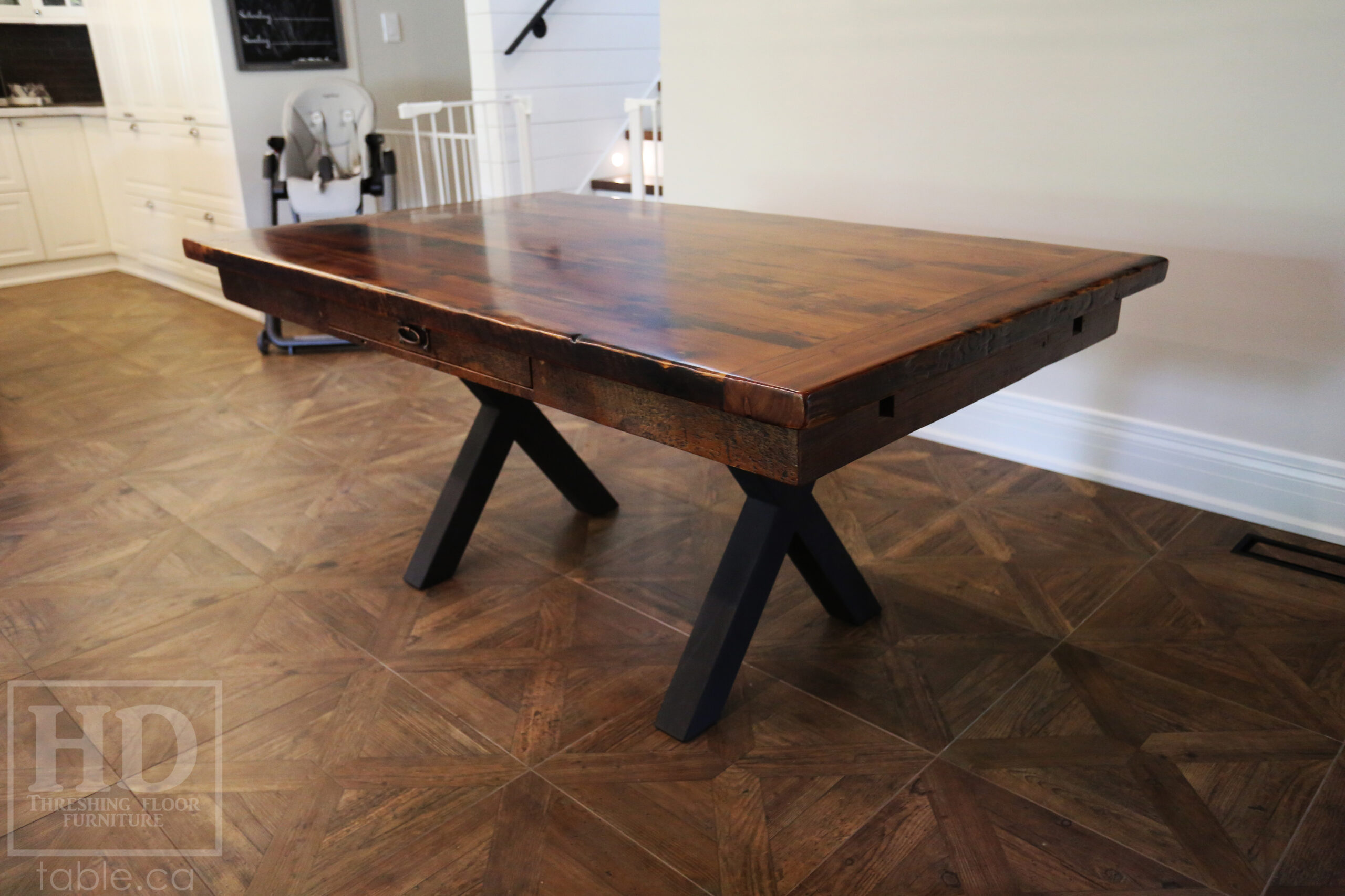 5.5â€™ Ontario Barnwood Table we made for a Dundas, Ontario Home â€“ 40â€ wide â€“ Matte Black X Shaped Base â€“ Skirting + Drawer Option - Old Growth Reclaimed Hemlock Threshing Floor Construction â€“ Original edges & distressing maintained - Premium epoxy + satin polyurethane finish â€“ Two 18â€ leaves - www.table.ca